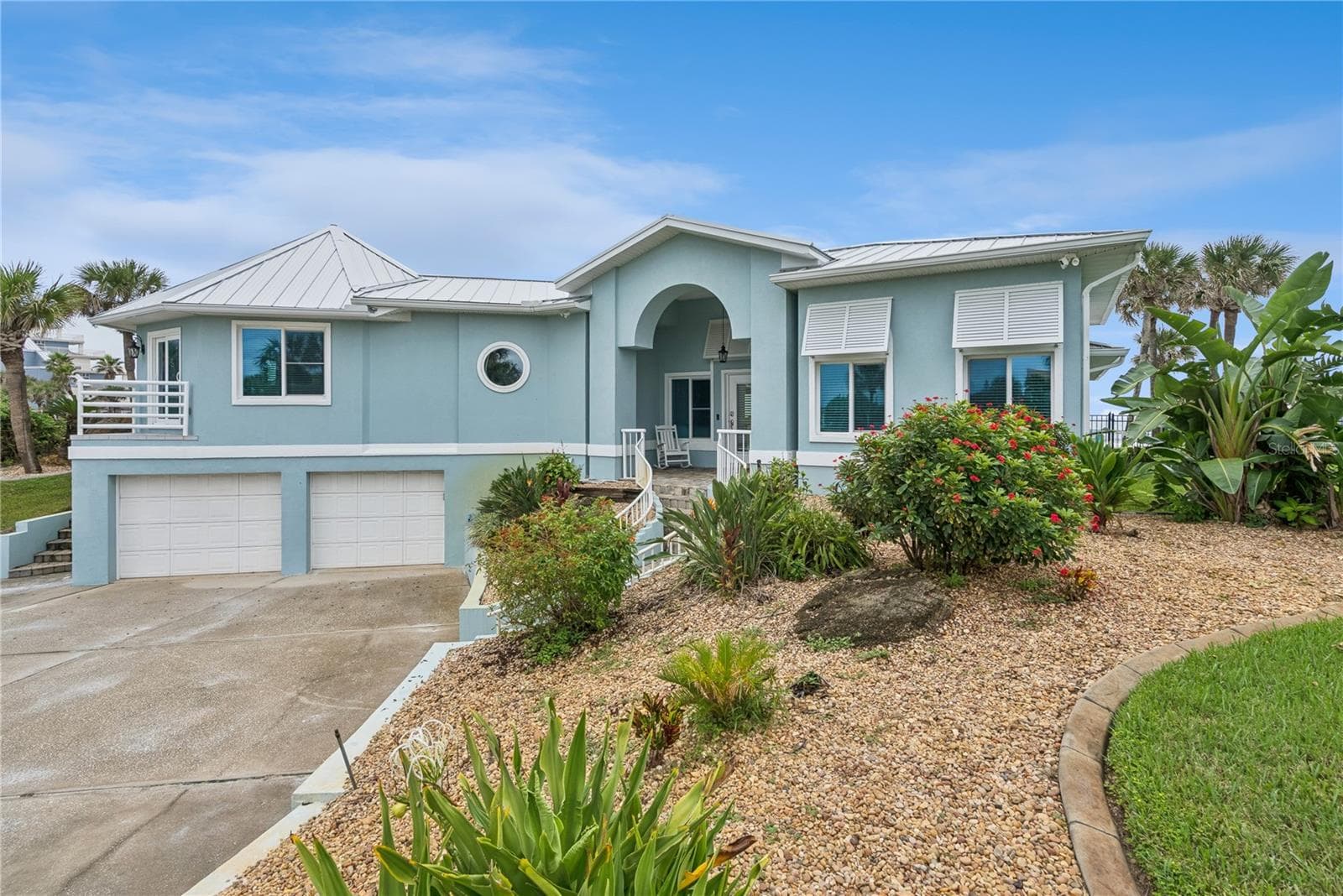 Set on over three-quarters of an acre with approximately 85 feet of ocean frontage, this property offers a generous setback from the road, ample driveway parking, and an attached garage. Neighboring Frank Rendon Park features a playground, covered picnic areas, restrooms, public beach access, and parking. - 2707 S ATLANTIC AVE, DAYTONA BEACH SHORES