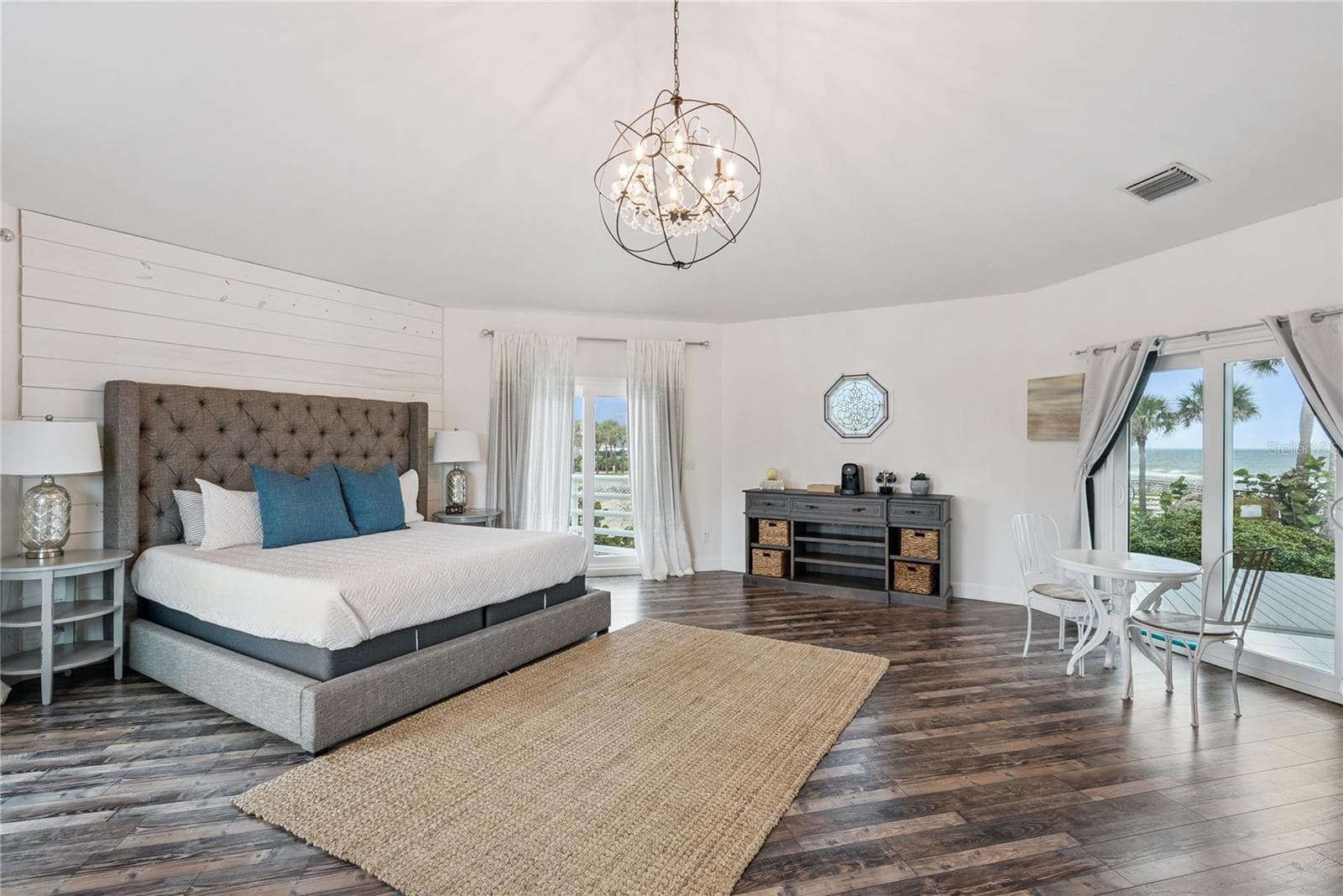 Primary suite: Spacious coastal retreat with ocean views, two large walk-in closets, and access to an oversized composite terrace overlooking the Atlantic - 2707 S ATLANTIC AVE, DAYTONA BEACH SHORES