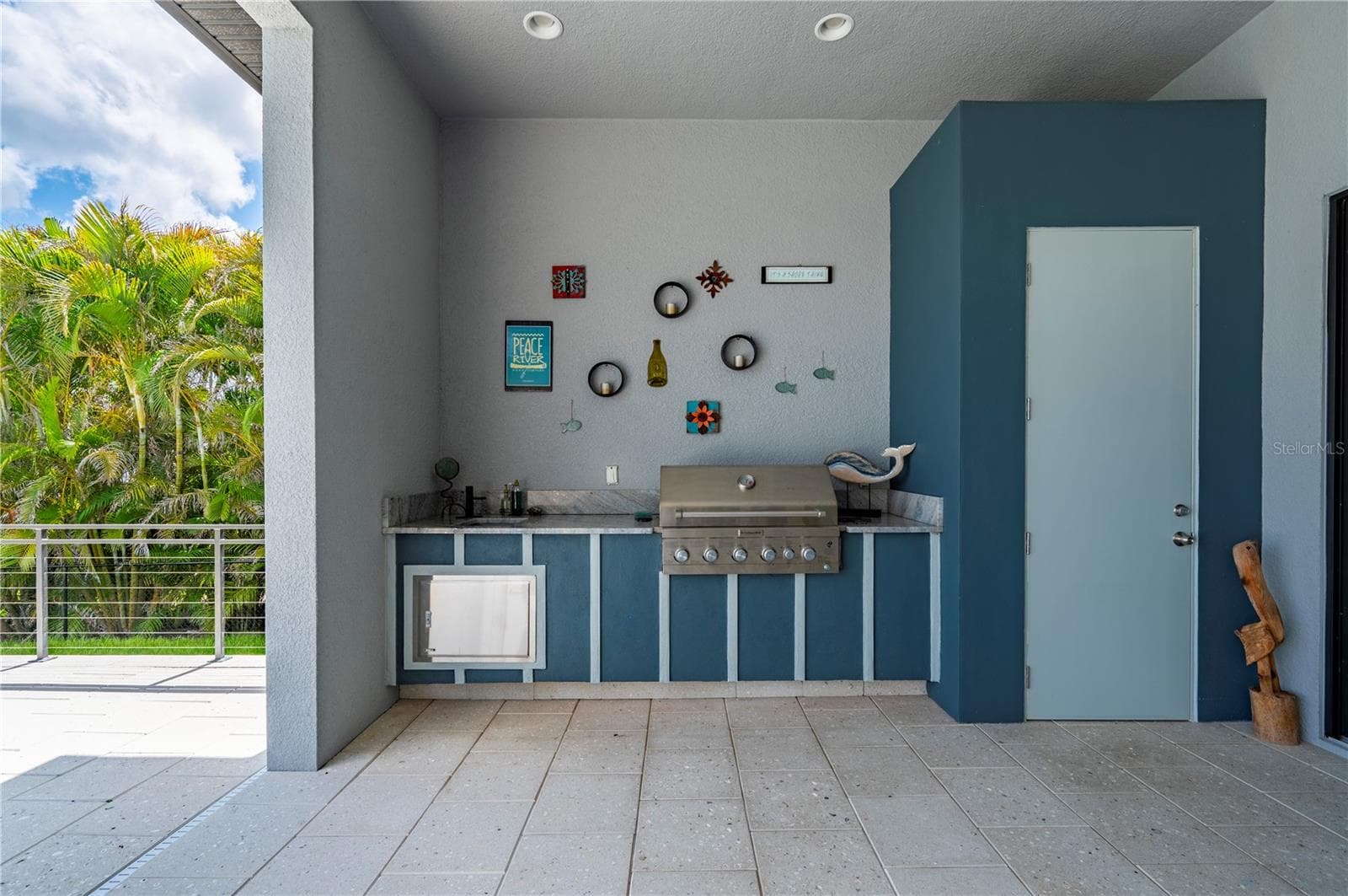 Outdoor kitchen and pool storage - 25462 SHORE DR, PUNTA GORDA