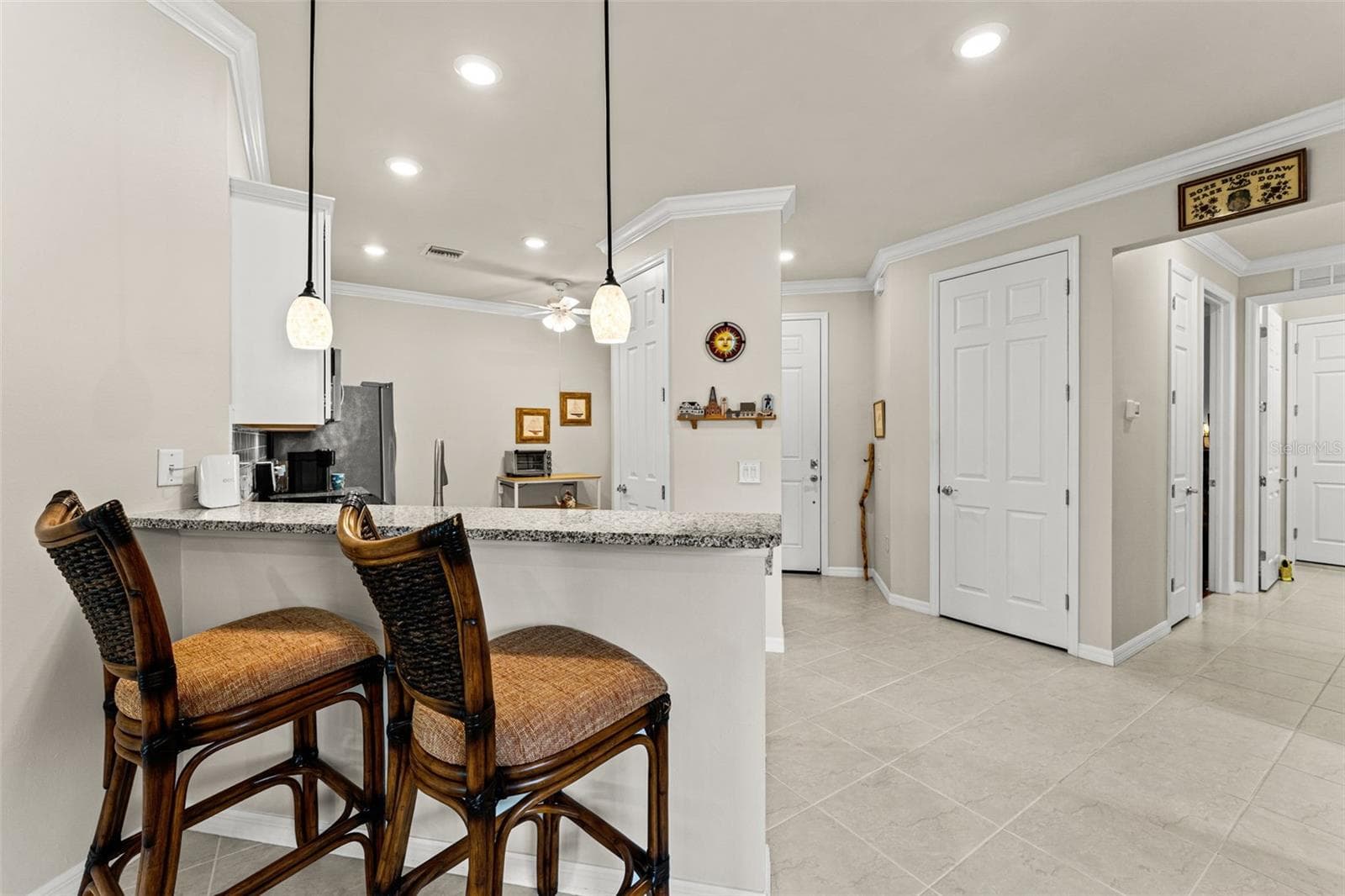 To the right is hallway to guest bed and bath, laundry and garage - 18831 LANUVIO ST, VENICE