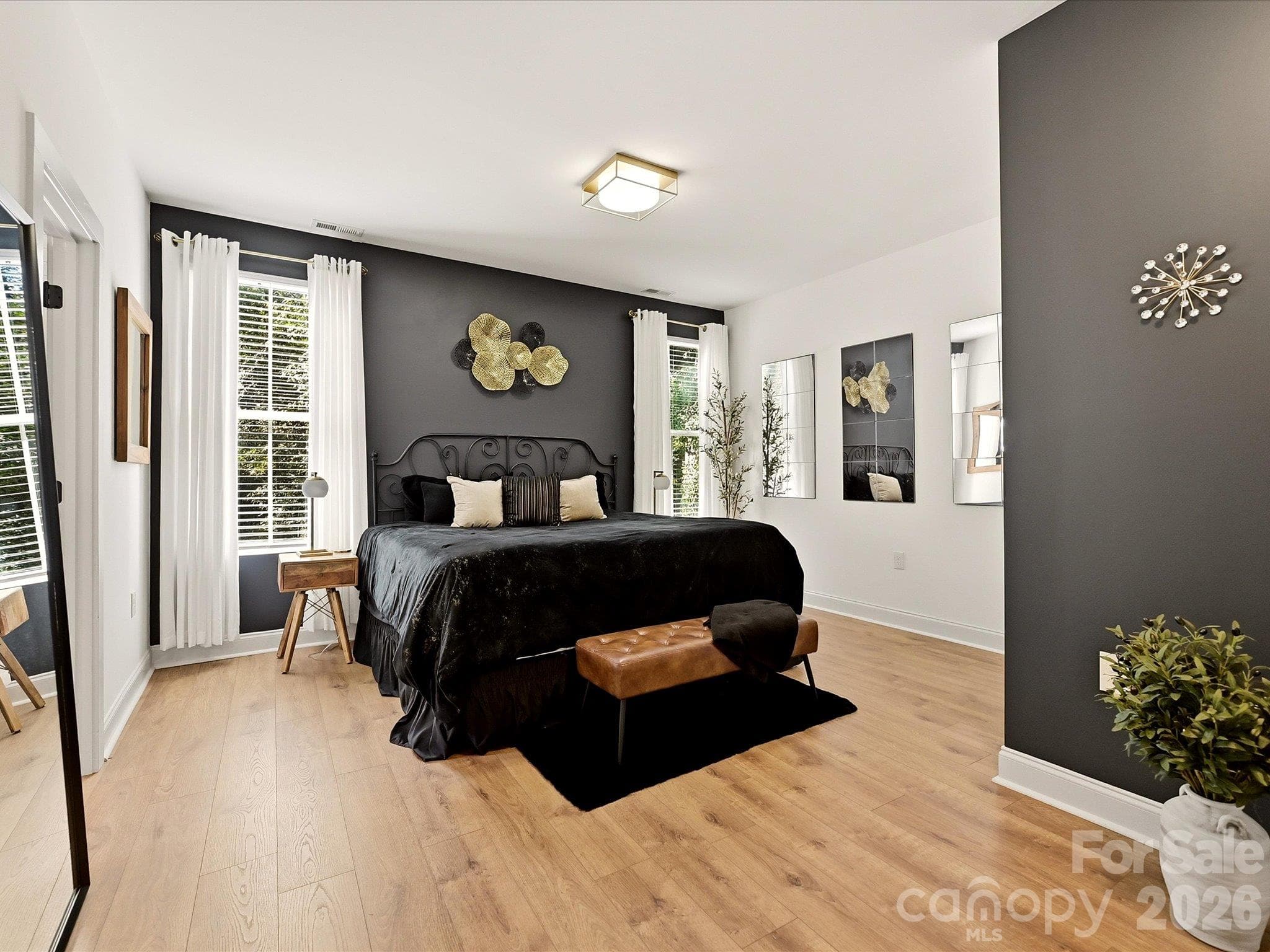 Luxury primary bedroom with accent walls - 914 Flint Street Extension, Rock Hill