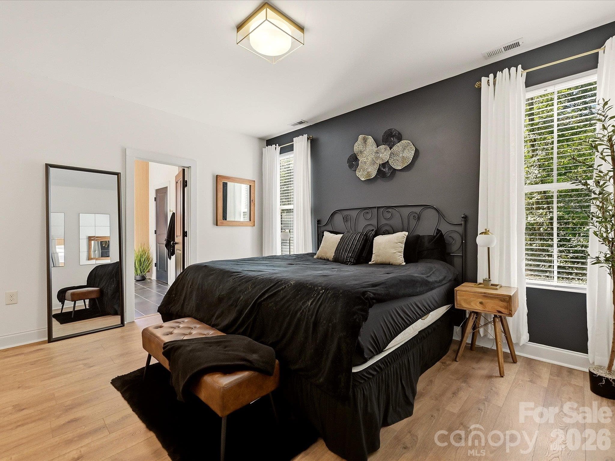 Luxury primary bedroom with accent walls - 914 Flint Street Extension, Rock Hill