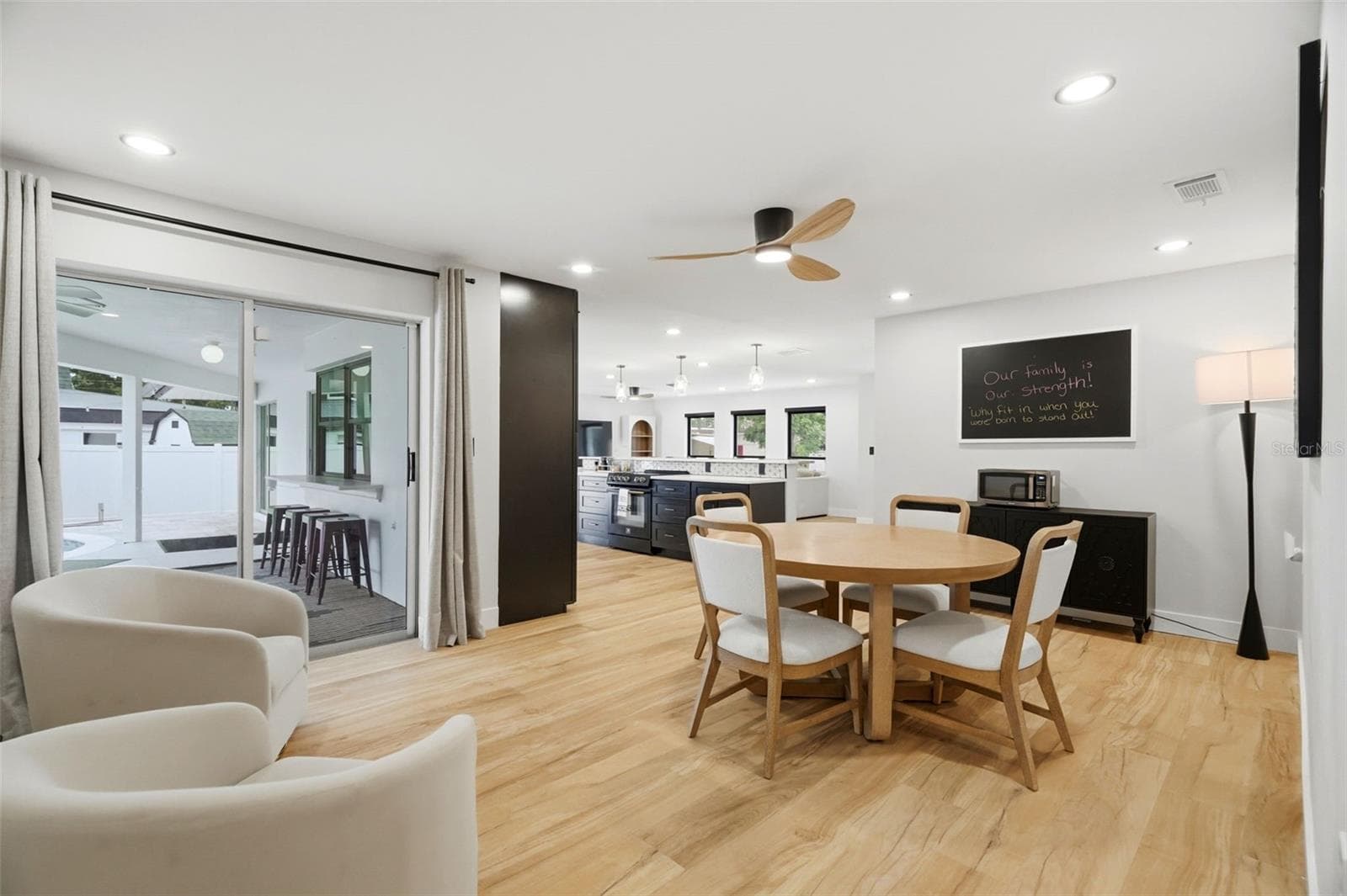 Dining Room overlooking the Pool - 330 PATICA RD NE, ST PETERSBURG