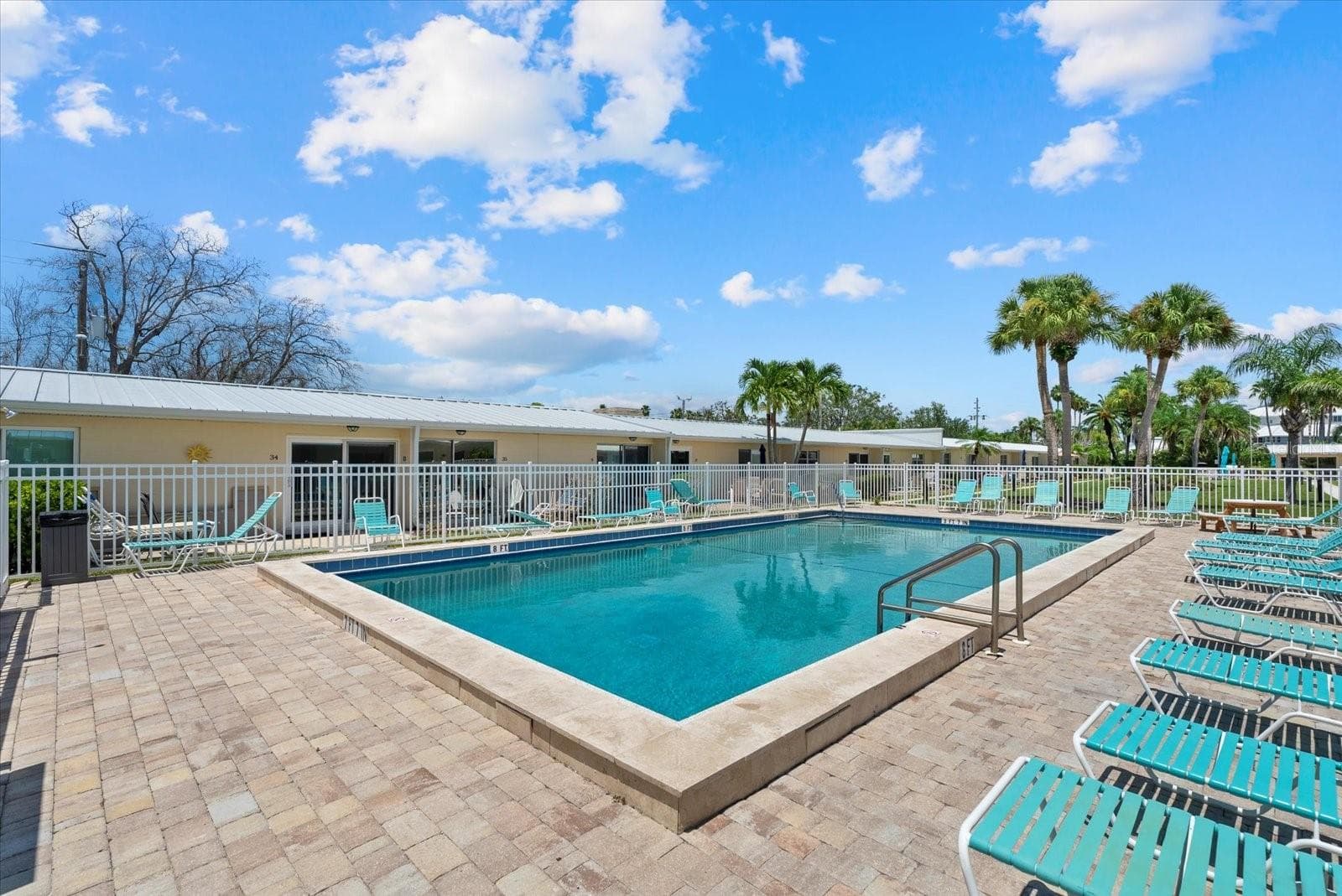 Pool 1 is located towards the front of the property - 5830 MIDNIGHT PASS RD #8, SARASOTA