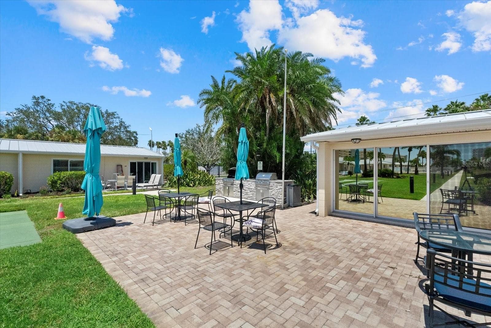 One of the outdoor grilling areas - 5830 MIDNIGHT PASS RD #8, SARASOTA