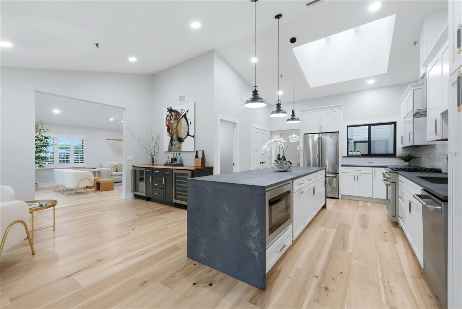 Kitchen opens to bar area - 2141 HARBOURSIDE DR #1203, LONGBOAT KEY