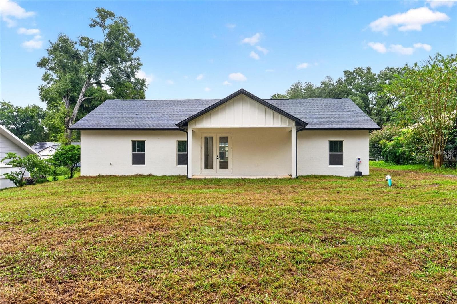 Backyard - 381 CARRIAGE LN, LADY LAKE