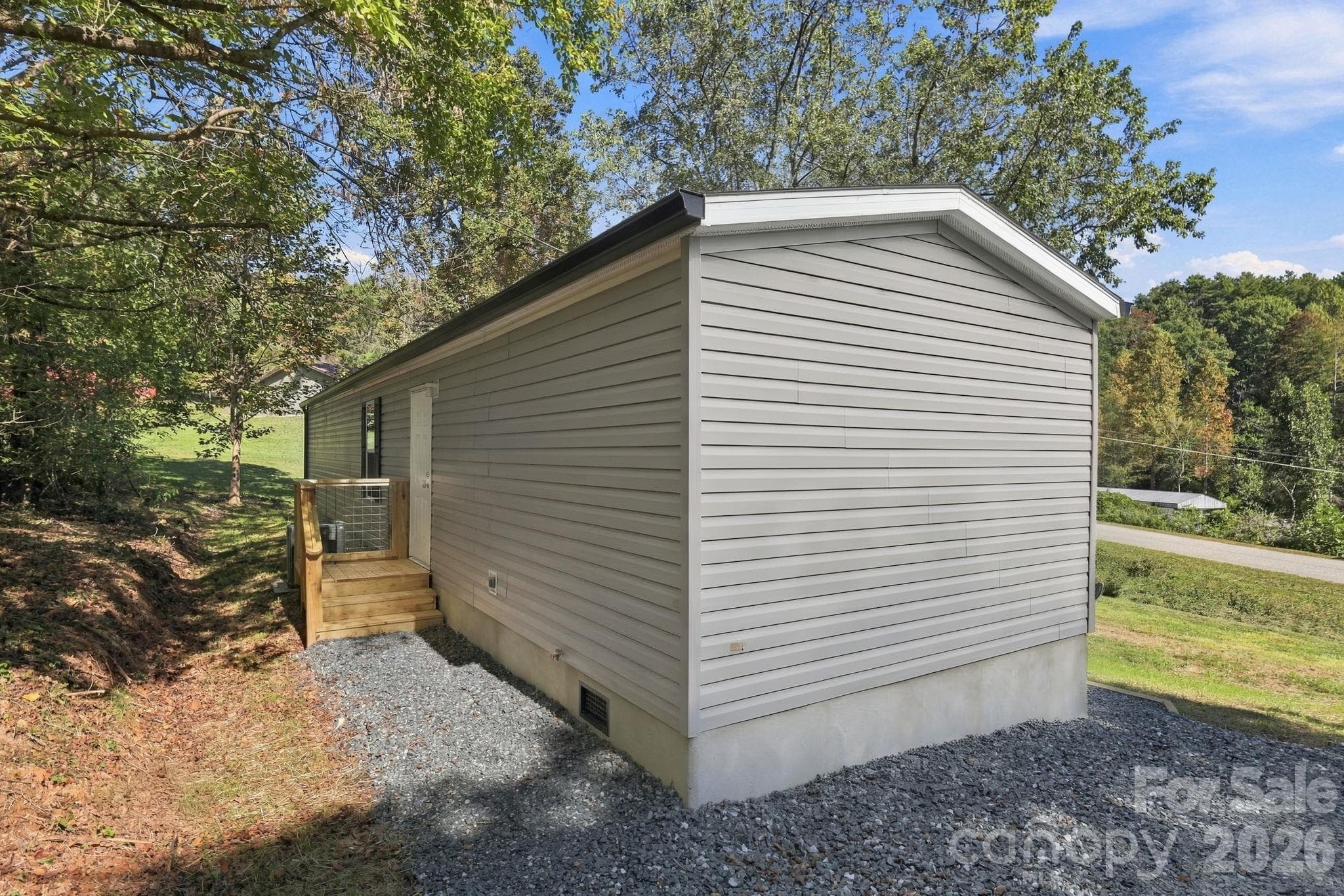 Back of property also offers low maintenance. - 85 Trent Road, Brevard