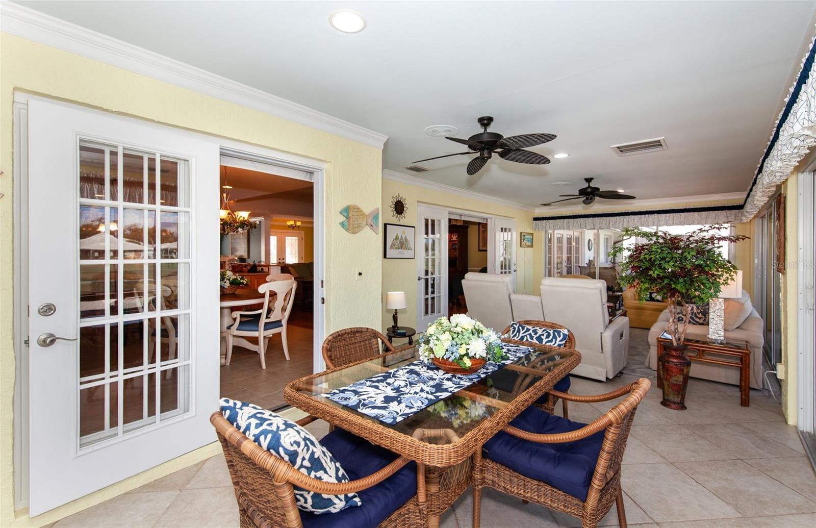 Florida room dinette area - 810 CARNOUSTIE DR, VENICE