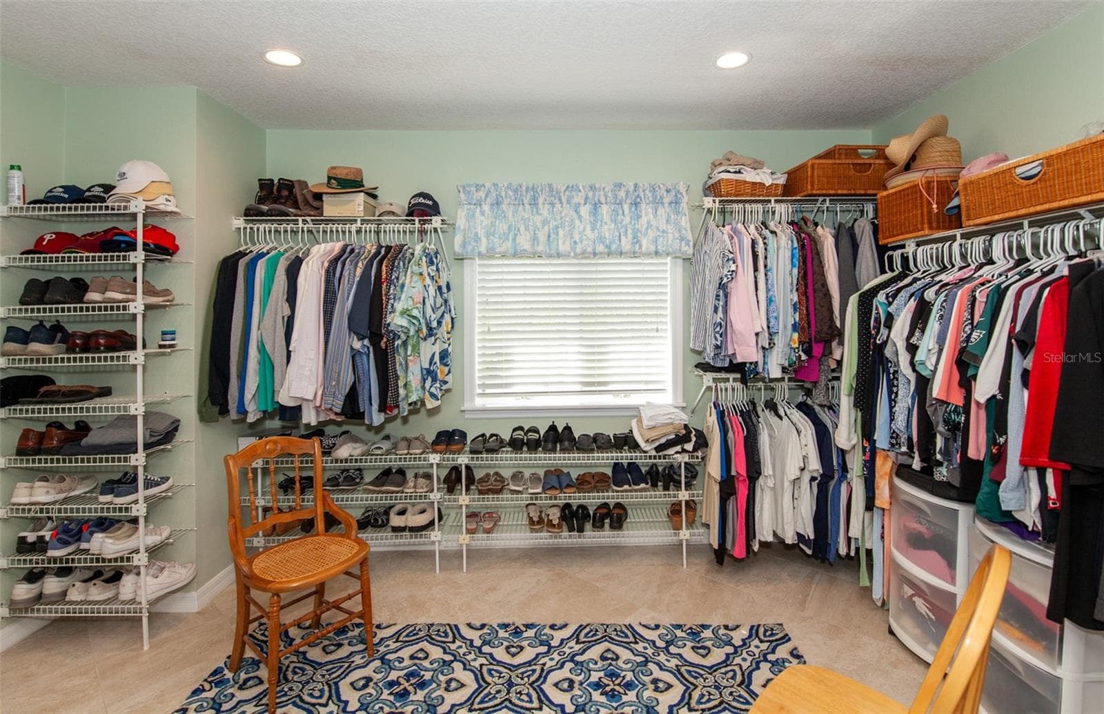 Master Primary closet/dressing room - 810 CARNOUSTIE DR, VENICE
