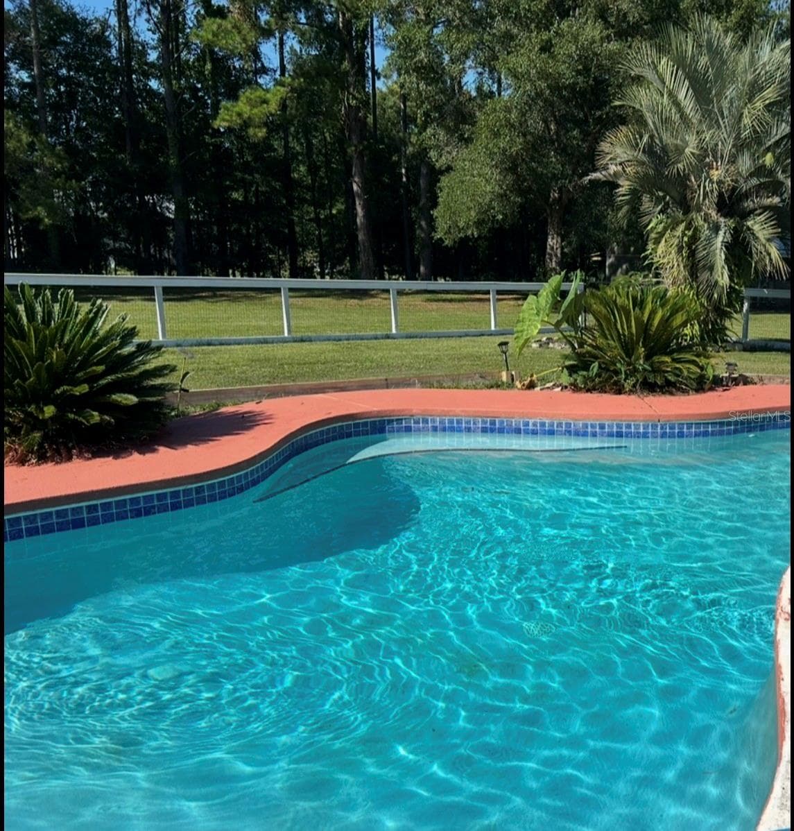 Single Family Residence at 12820 NW 116TH PL, ALACHUA, photo 6 of 12