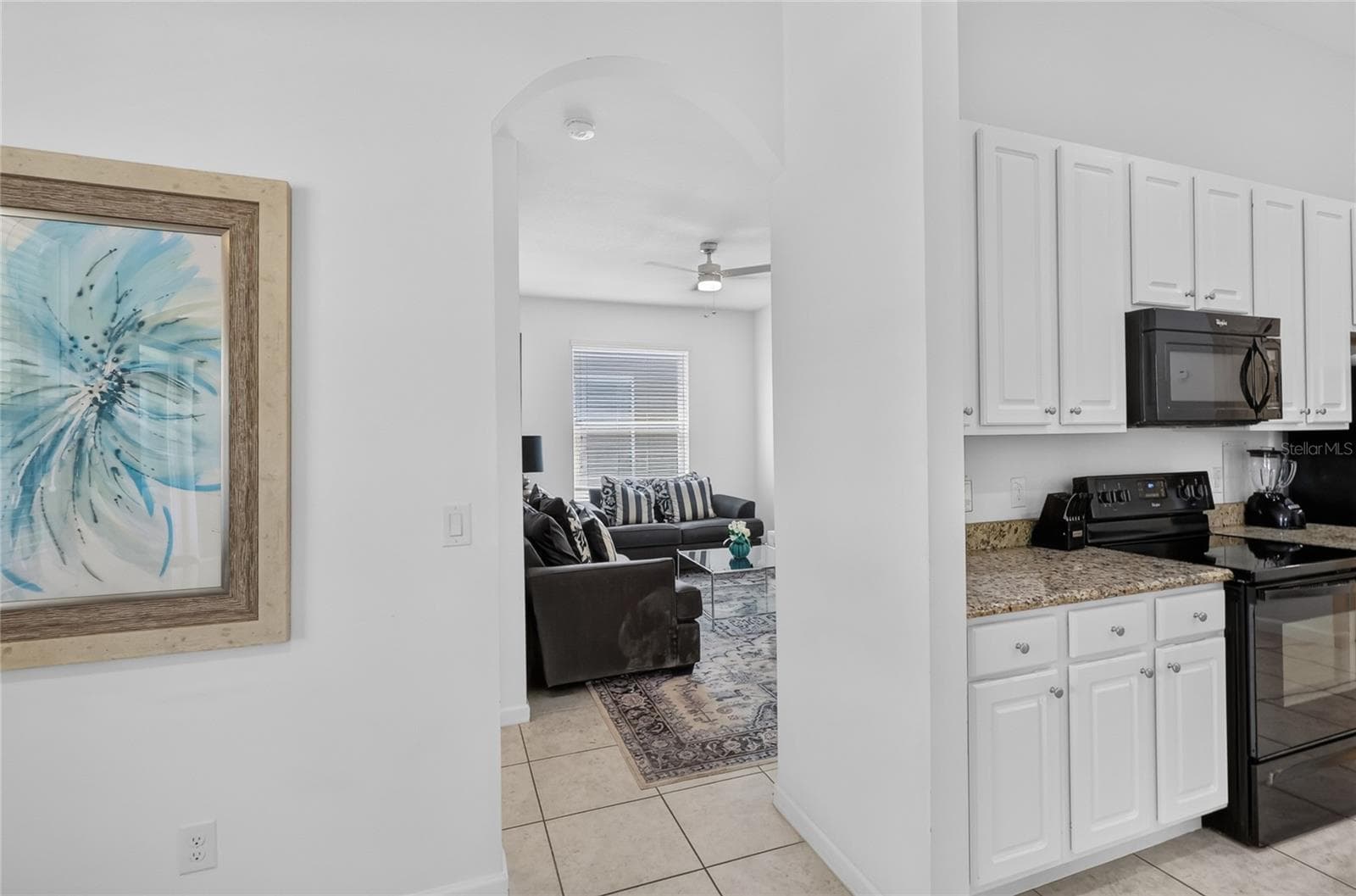 Kitchen looking towards formal living room - 277 YELLOW SNAPDRAGON DR, DAVENPORT