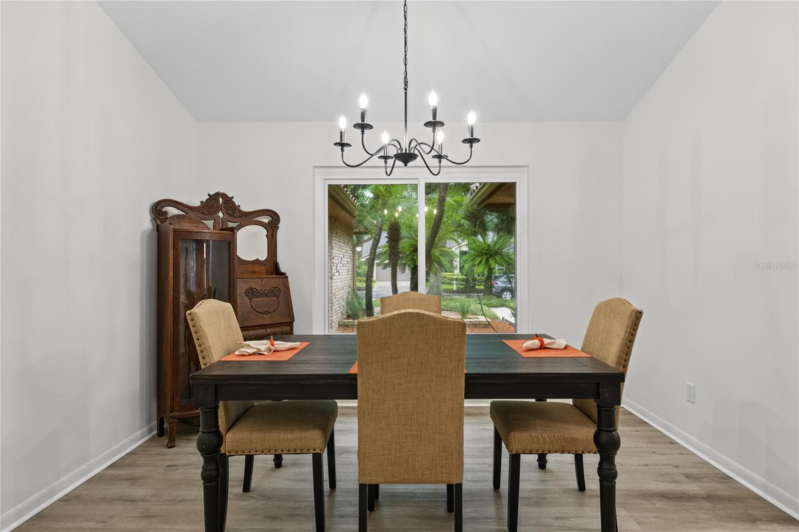DINING ROOM VIEWS NATURE THROUGH BIG WINDOW - 2194 PINNACLE CIR N, PALM HARBOR