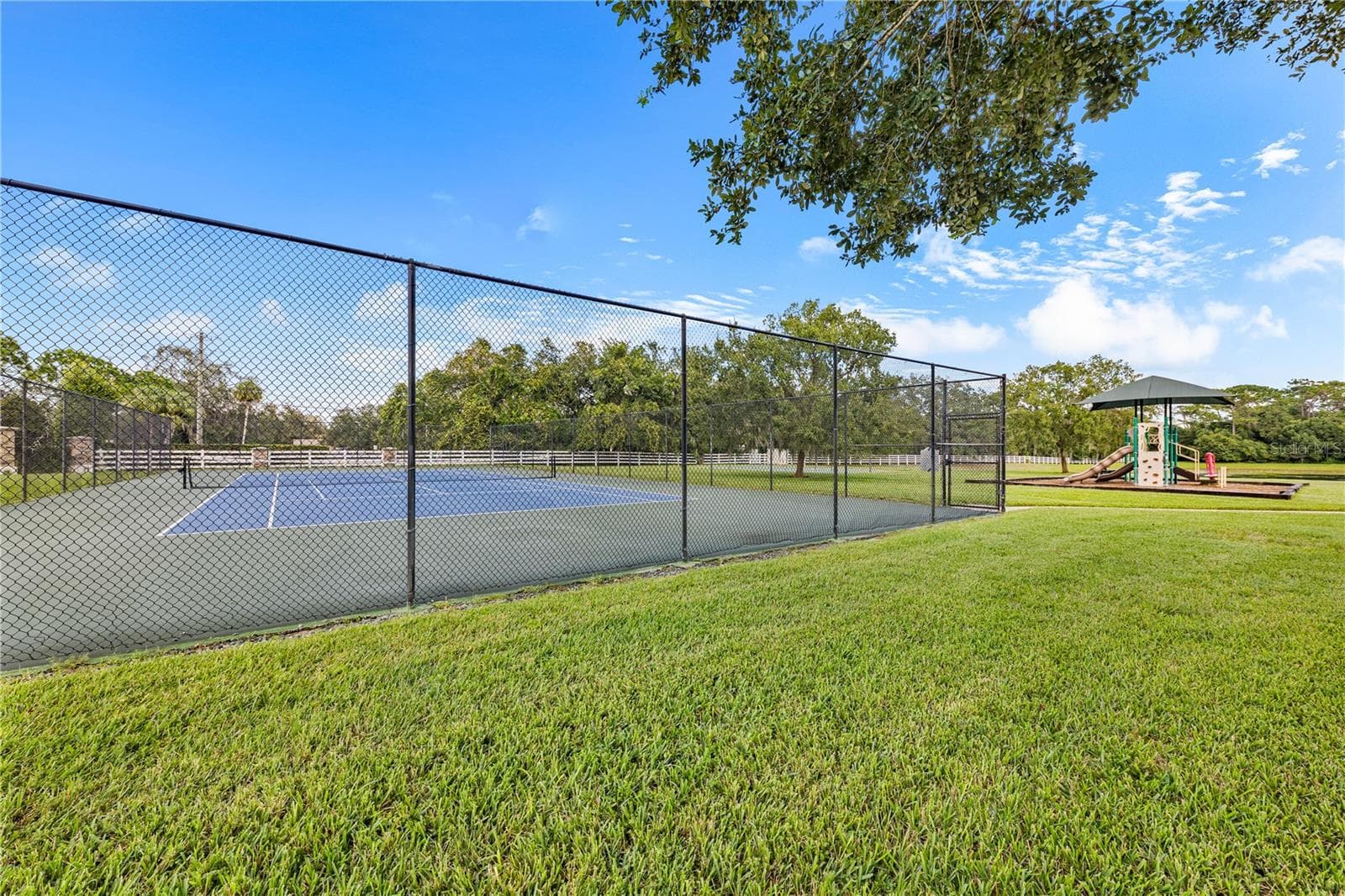COMMUNITY TENNIS COURT - 755 MILLS ESTATE PL, CHULUOTA