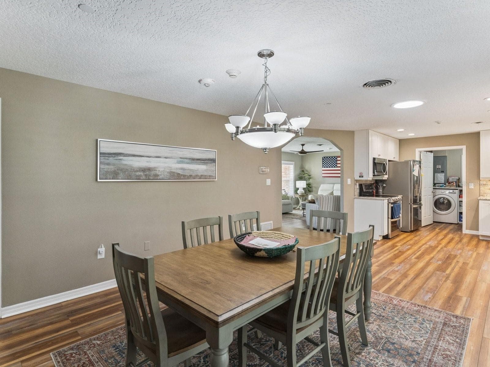 Dining room with abundant natural light - SPRING LAKE MANOR, FRUITLAND PARK