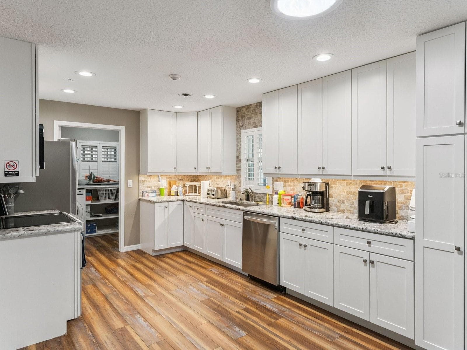Granite counters and undermount sink - SPRING LAKE MANOR, FRUITLAND PARK