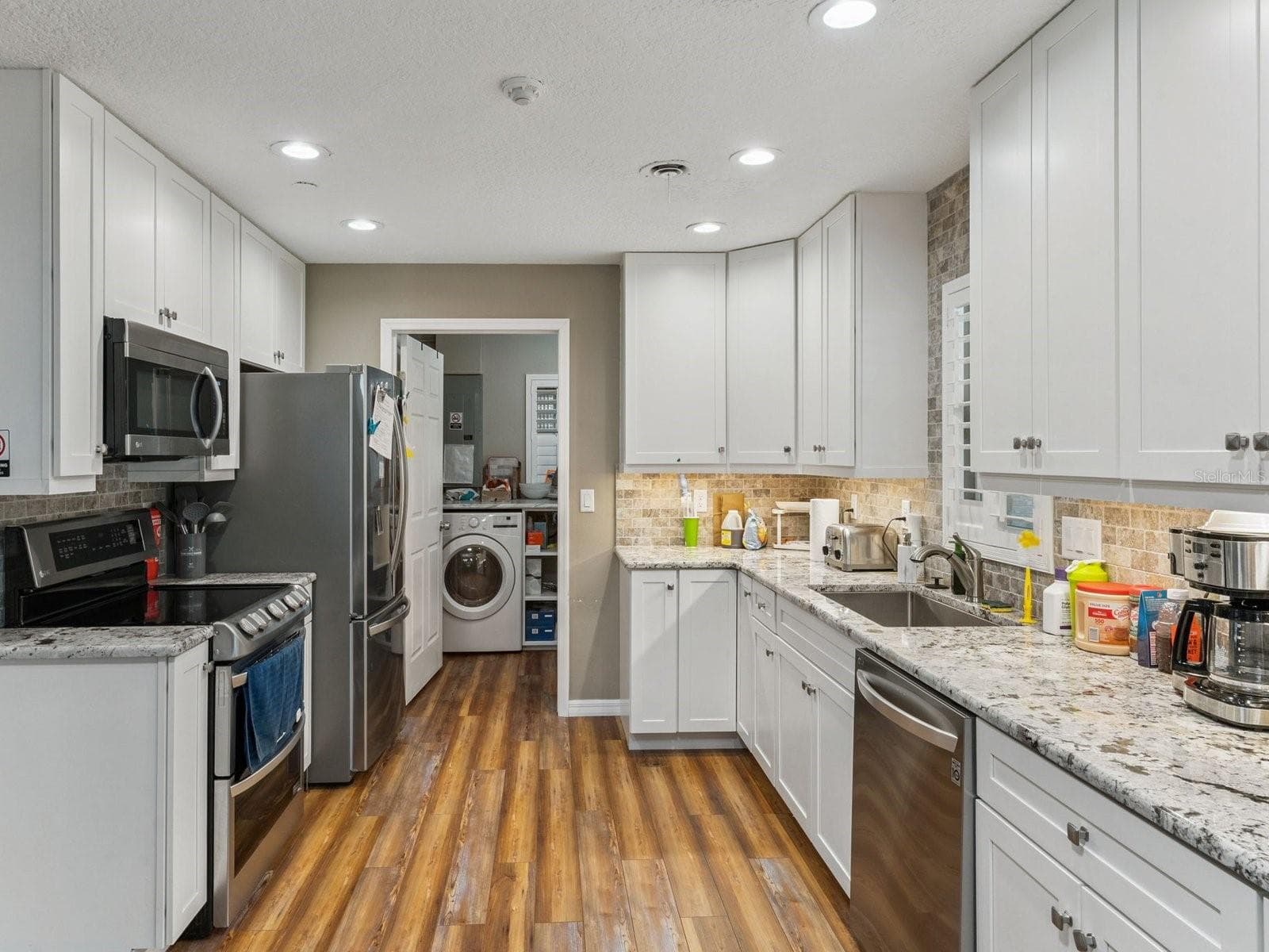 Stainless appliances and granite counters - SPRING LAKE MANOR, FRUITLAND PARK