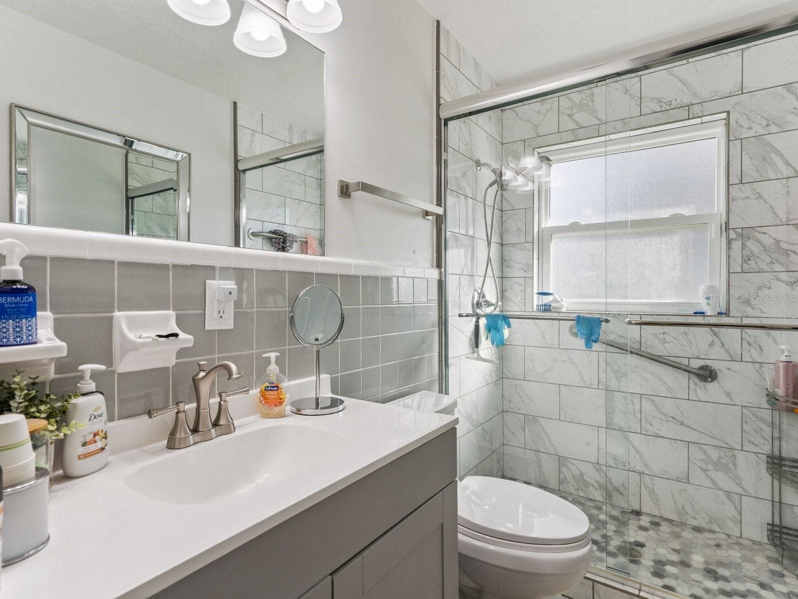 Hall bath with tiled walk-in shower - SPRING LAKE MANOR, FRUITLAND PARK