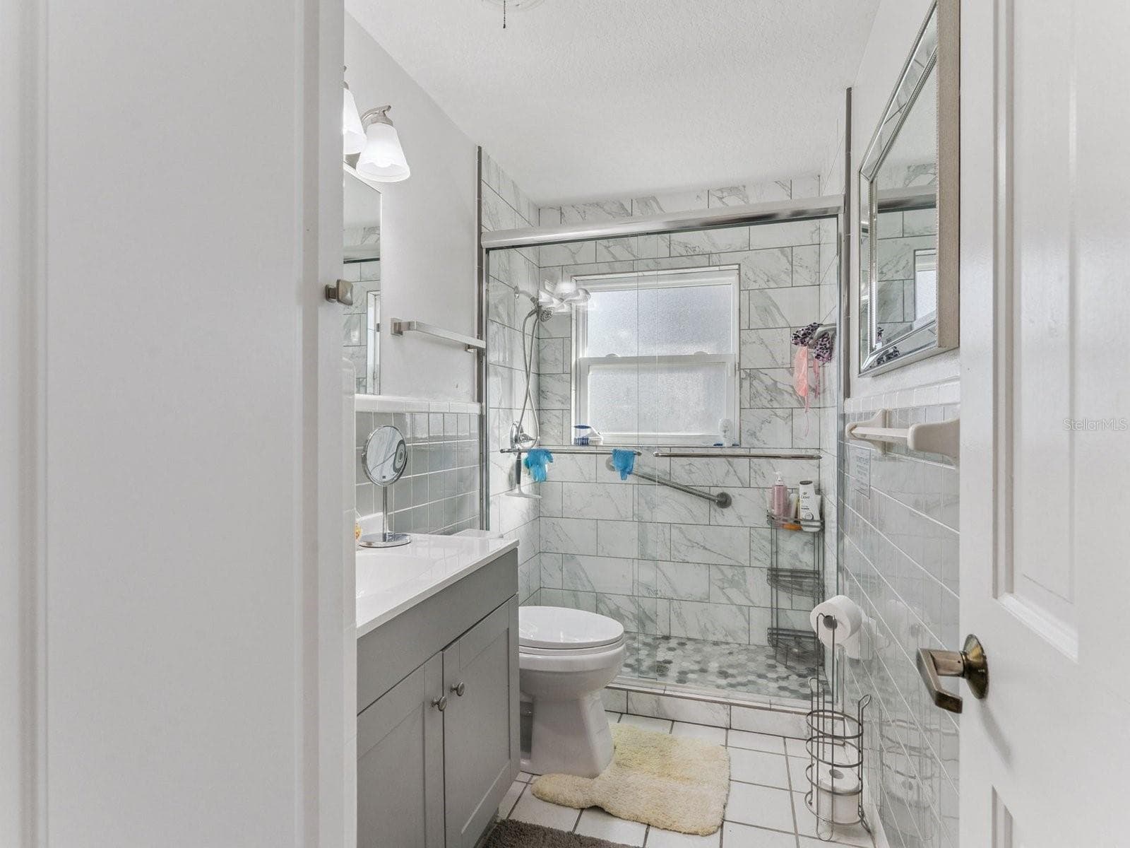 Walk-in shower with grab bars - SPRING LAKE MANOR, FRUITLAND PARK
