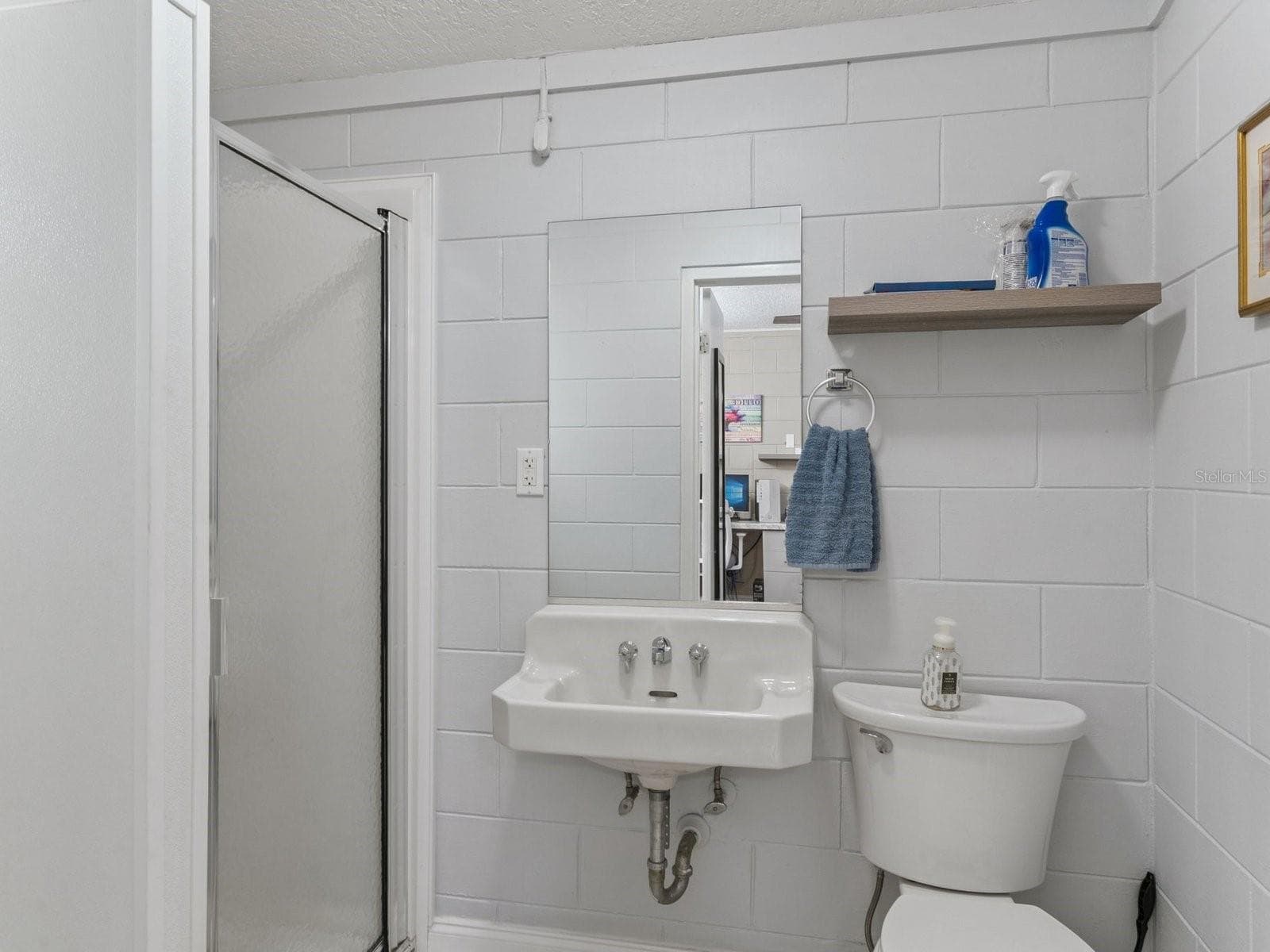 Office's private full bathroom with stall shower - SPRING LAKE MANOR, FRUITLAND PARK