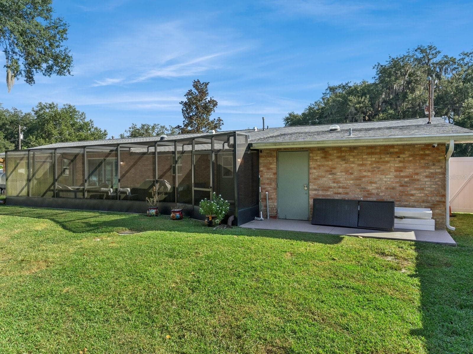 Rear exterior and lanai - SPRING LAKE MANOR, FRUITLAND PARK