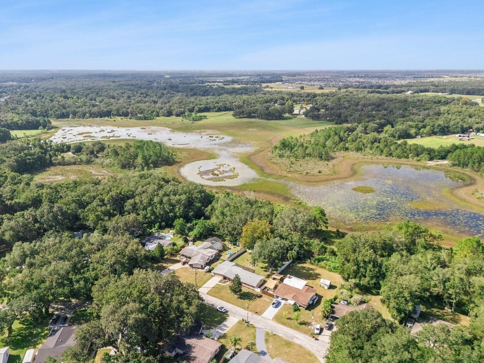 Wide aerial of Spring Lake and surrounding area - SPRING LAKE MANOR, FRUITLAND PARK