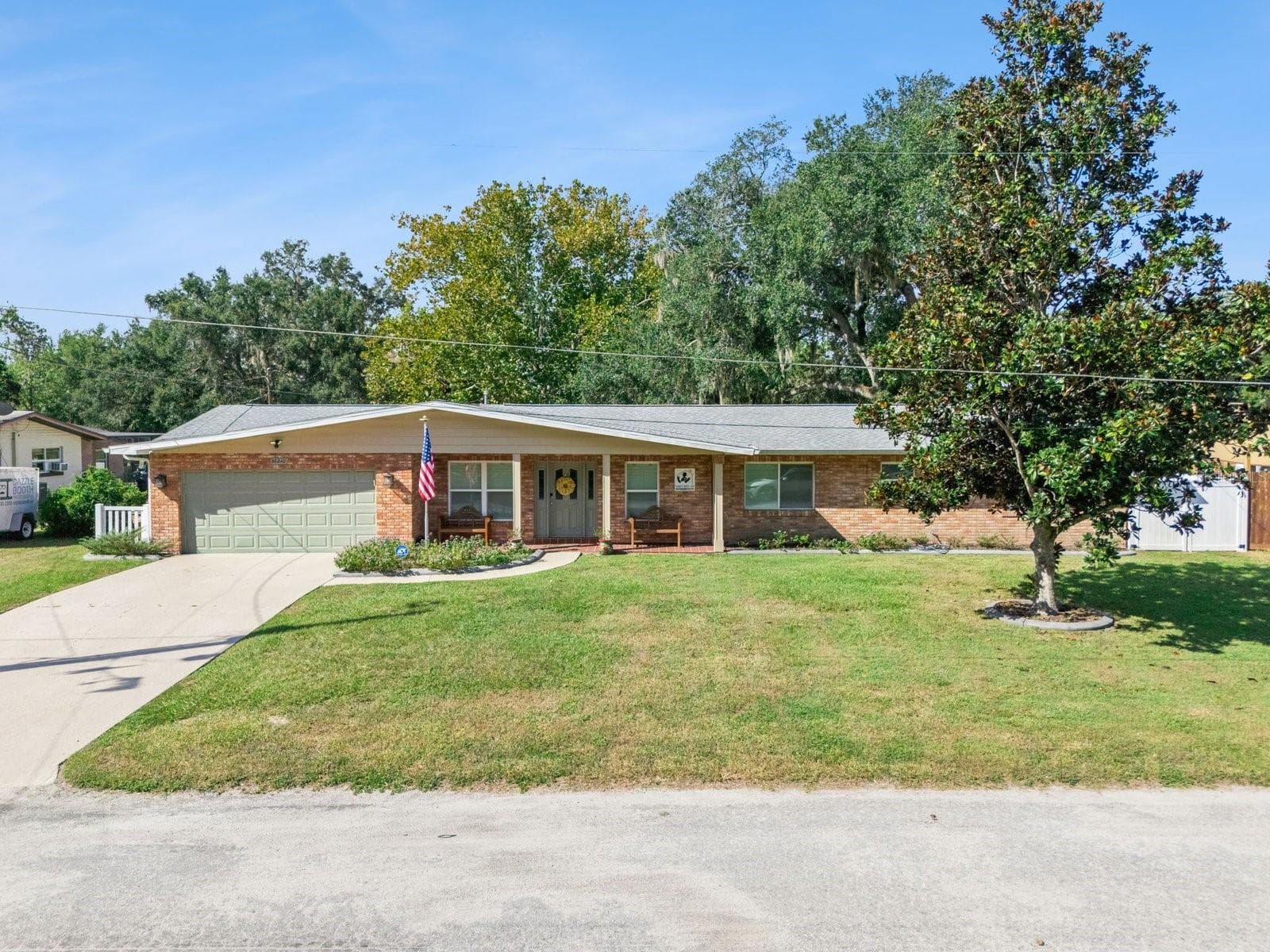 Front exterior with landscaped yard - SPRING LAKE MANOR, FRUITLAND PARK