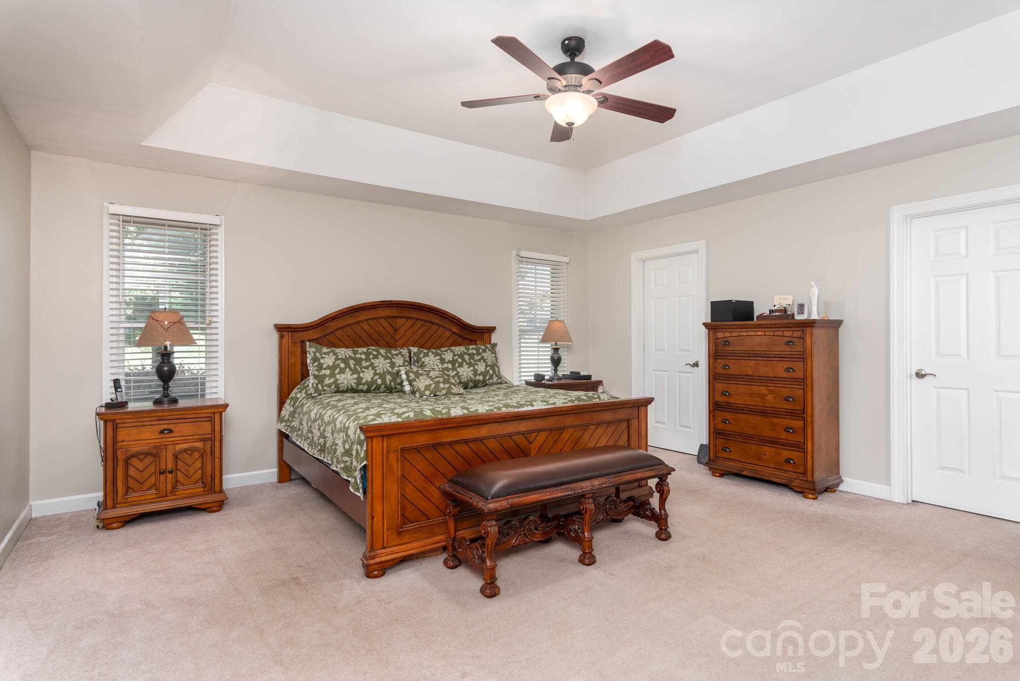 Large primary bedroom with tray ceiling and 2 walk in closets - 2915 Woodfield Lane, Lincolnton