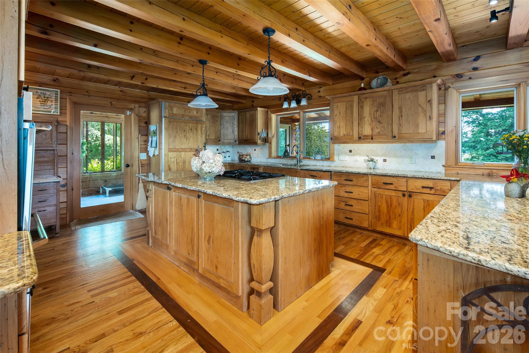 Wormy chestnut wood, believed to be reclaimed from an old cabin on the land. - 316 Stevenson Cove Road, Waynesville