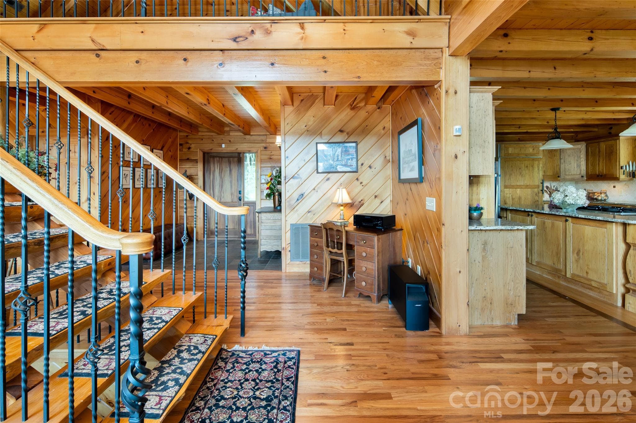 Foyer entry. Stairs lead to the loft and two en-suite bedrooms. - 316 Stevenson Cove Road, Waynesville