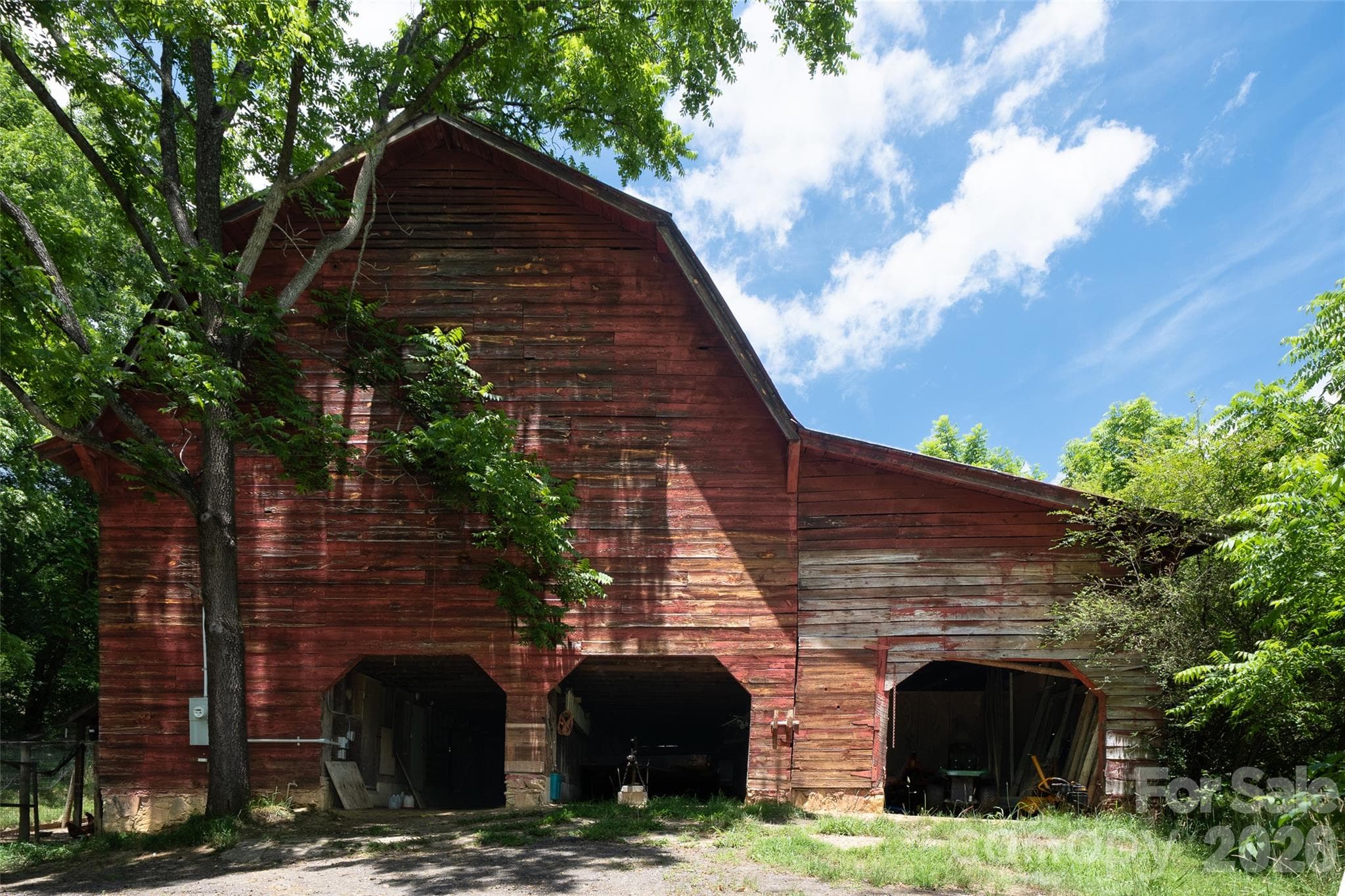 Red barn with silo. - 316 Stevenson Cove Road, Waynesville