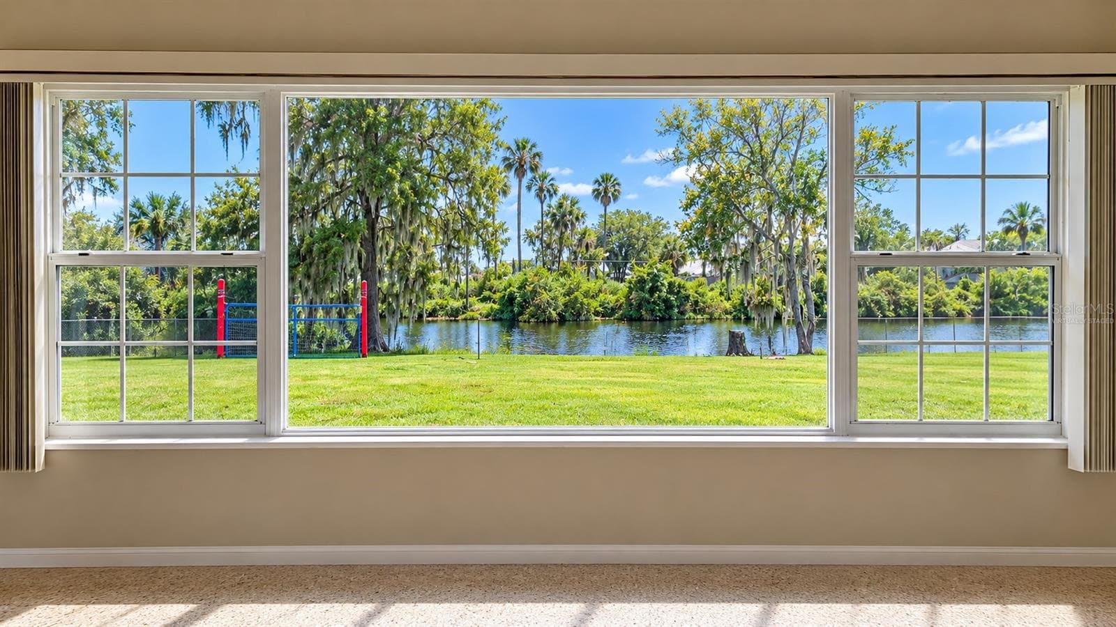 Pond view Virtually Staged - 15150 COLLEY DR, TAVARES
