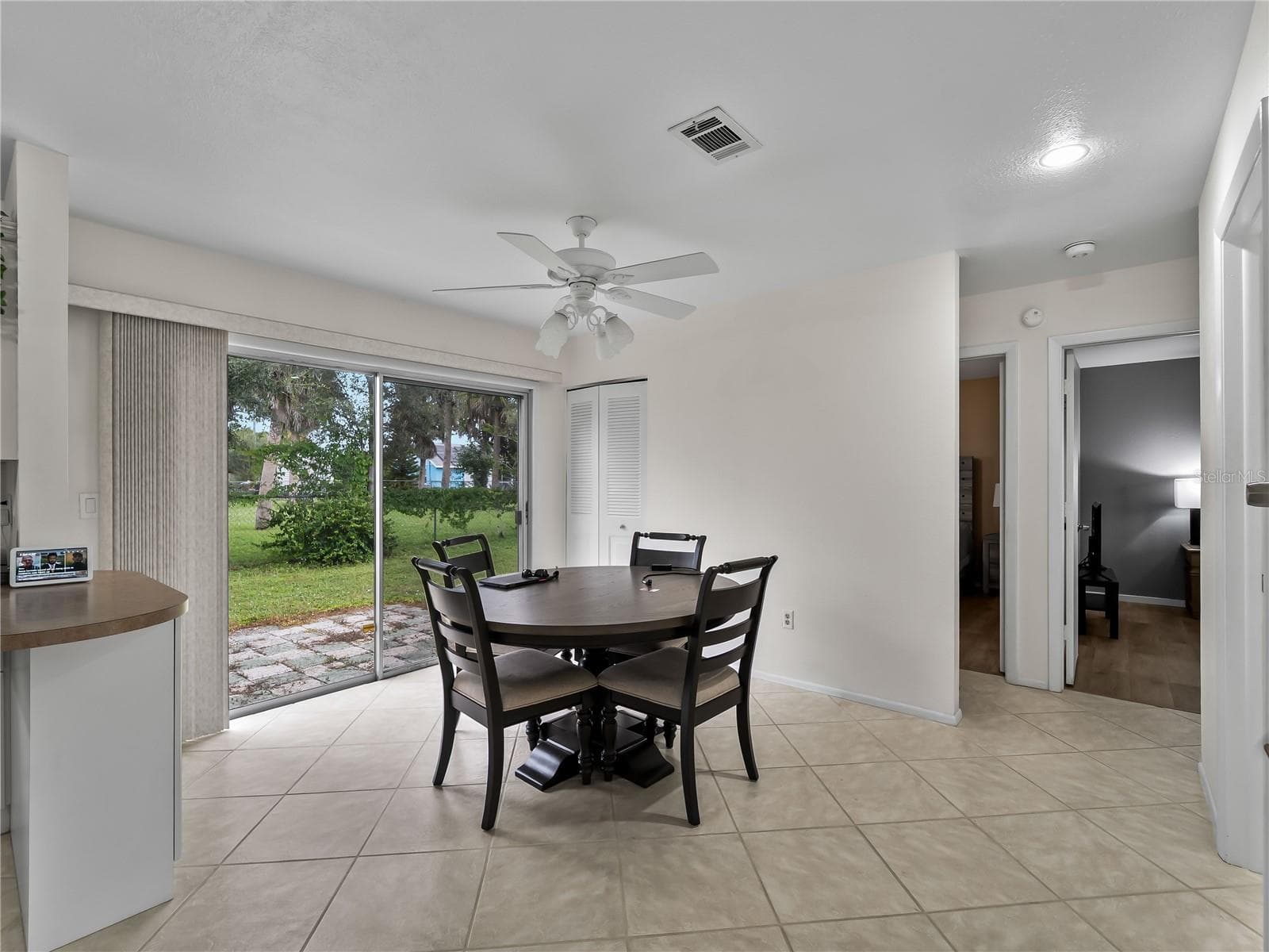 DiningRoom_8130PickwickRd_NorthPort_NaturalLight_SliderView.jpg - 8130 PICKWICK RD, NORTH PORT