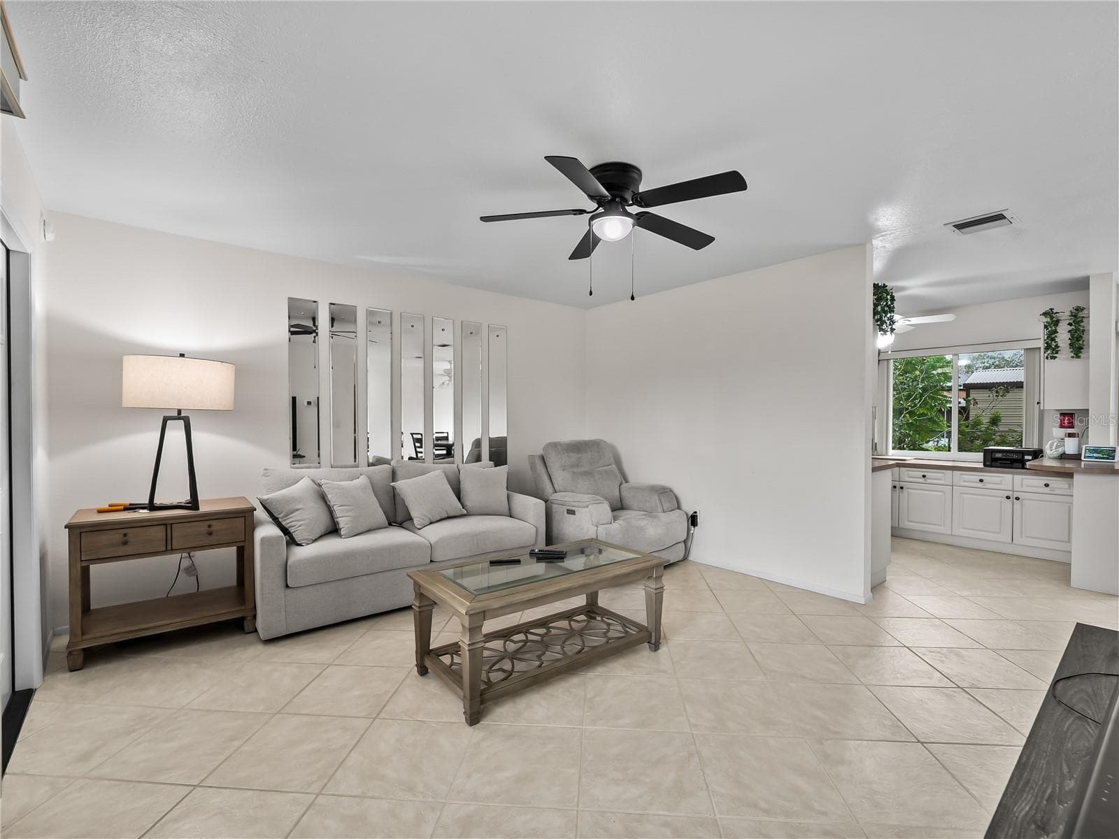 LivingRoom_8130PickwickRd_NorthPort_NaturalLight_Wide2.jpg - 8130 PICKWICK RD, NORTH PORT