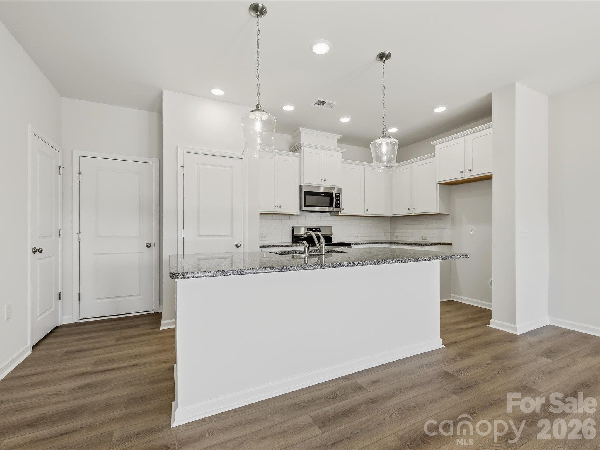 Kitchen with Large Island - 6617 Fire Lily Lane, Charlotte