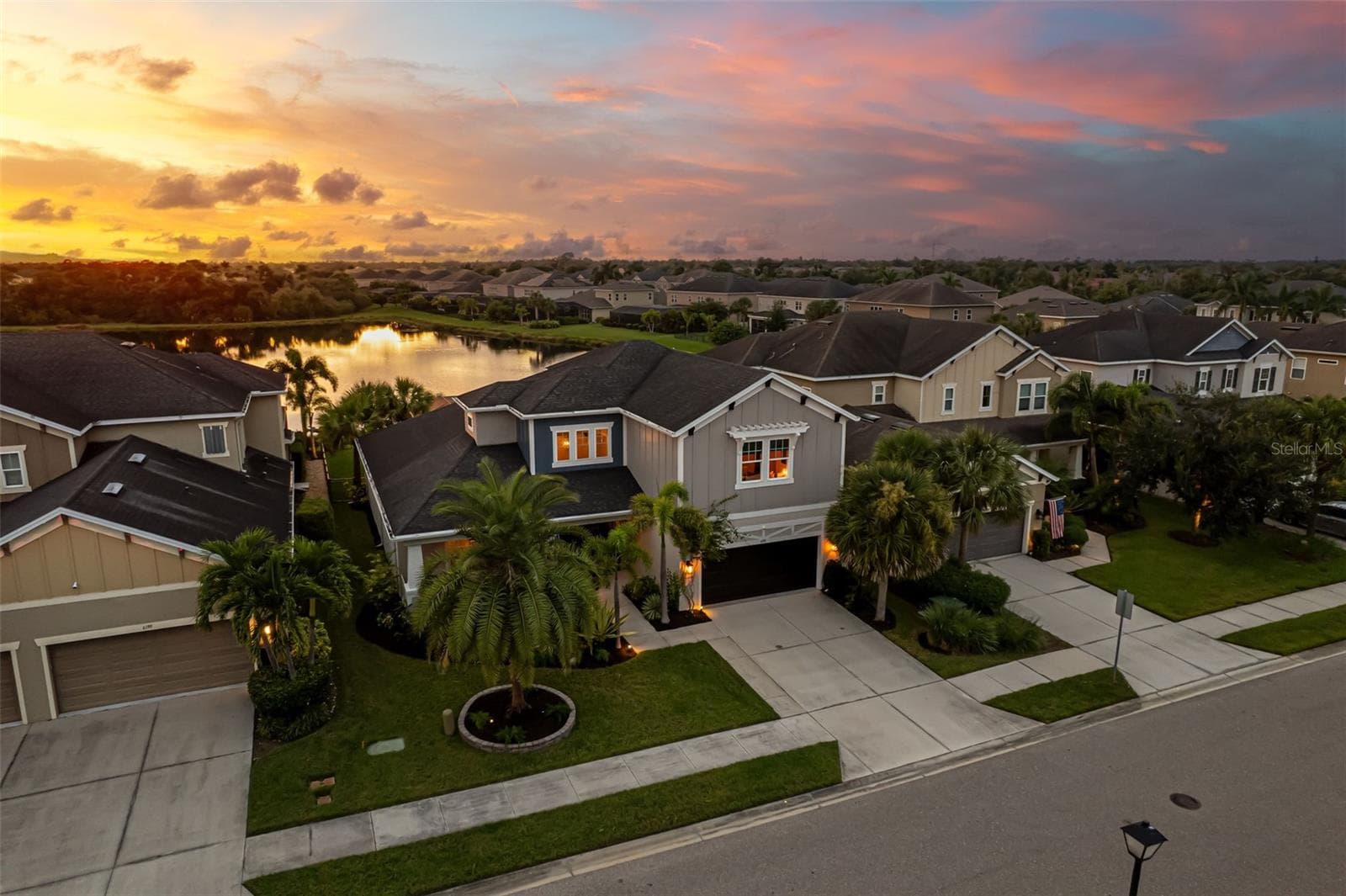 Beautiful lake views and spectacular sunset skies. - 6195 ANISE DR, SARASOTA