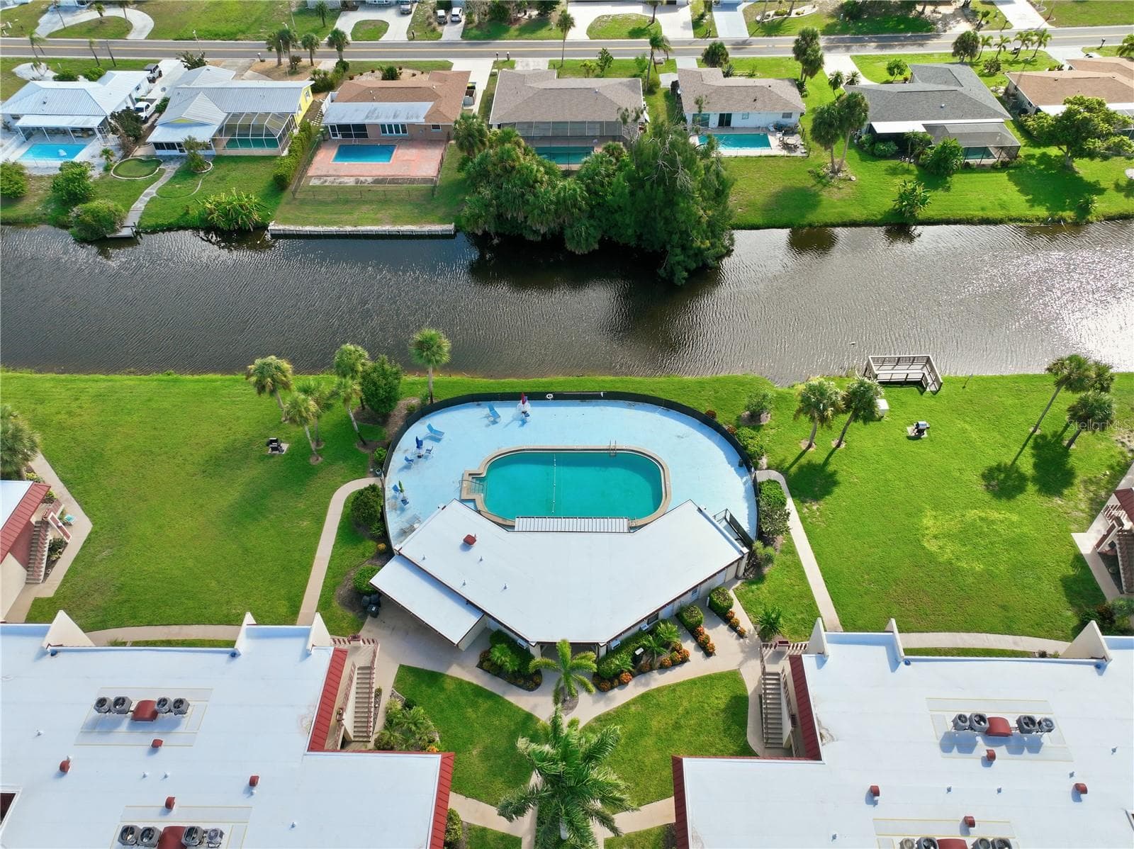 Aerial-small heated pool-clubhouse - 93 BOUNDARY BLVD #302, ROTONDA WEST