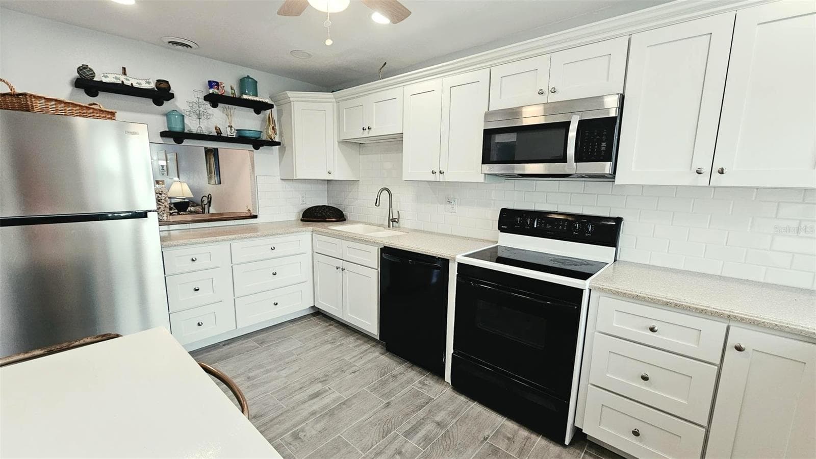 Kitchen-Corian counter tops - 93 BOUNDARY BLVD #302, ROTONDA WEST