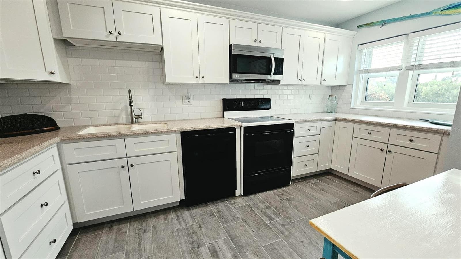 Kitchen-Corian counter tops - 93 BOUNDARY BLVD #302, ROTONDA WEST
