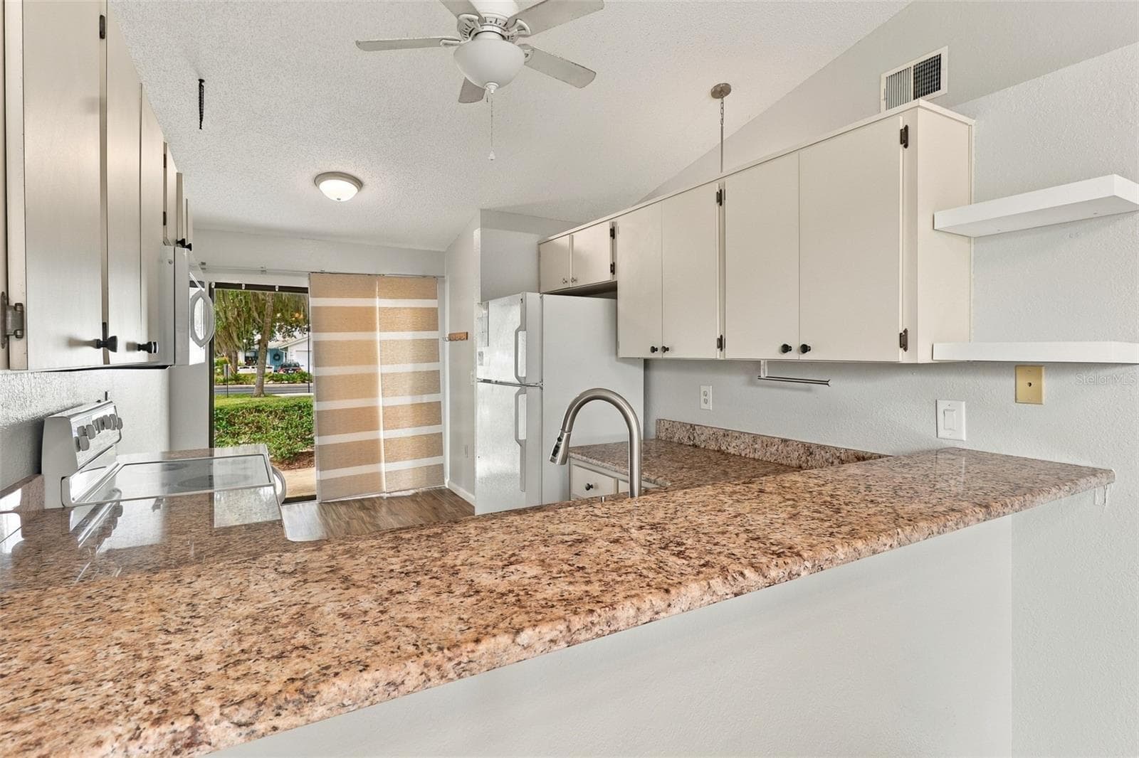 Kitchen counter and breakfast nook seating area - 480 LANDING BLVD, INVERNESS