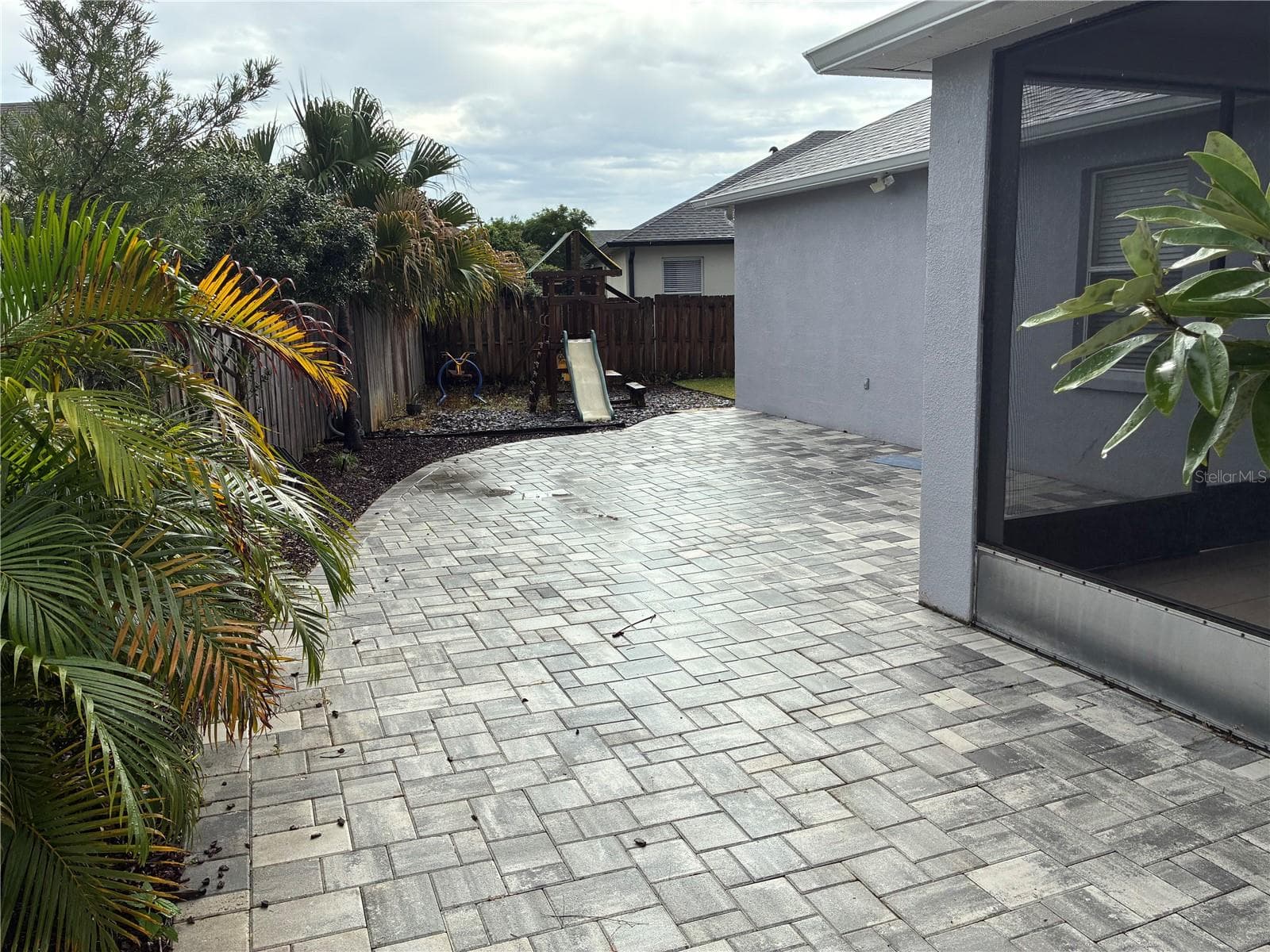 Rear Porch and backyard pavers - 14212 SUNRIVER AVE, ORLANDO