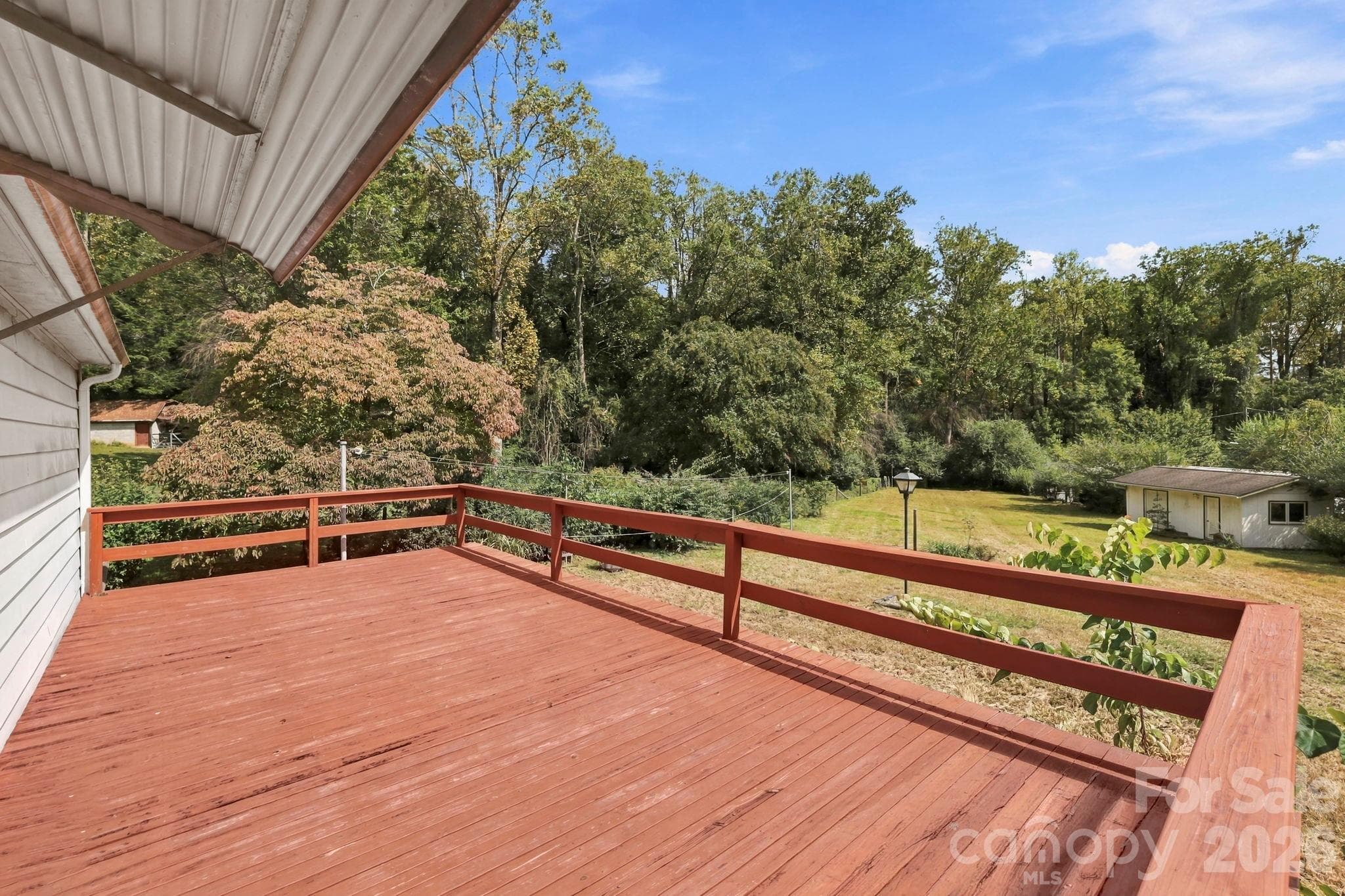 Large deck on rear of home overlooks spacious back yard - 648 Crystal Drive - 648 Crystal Drive, Hendersonville