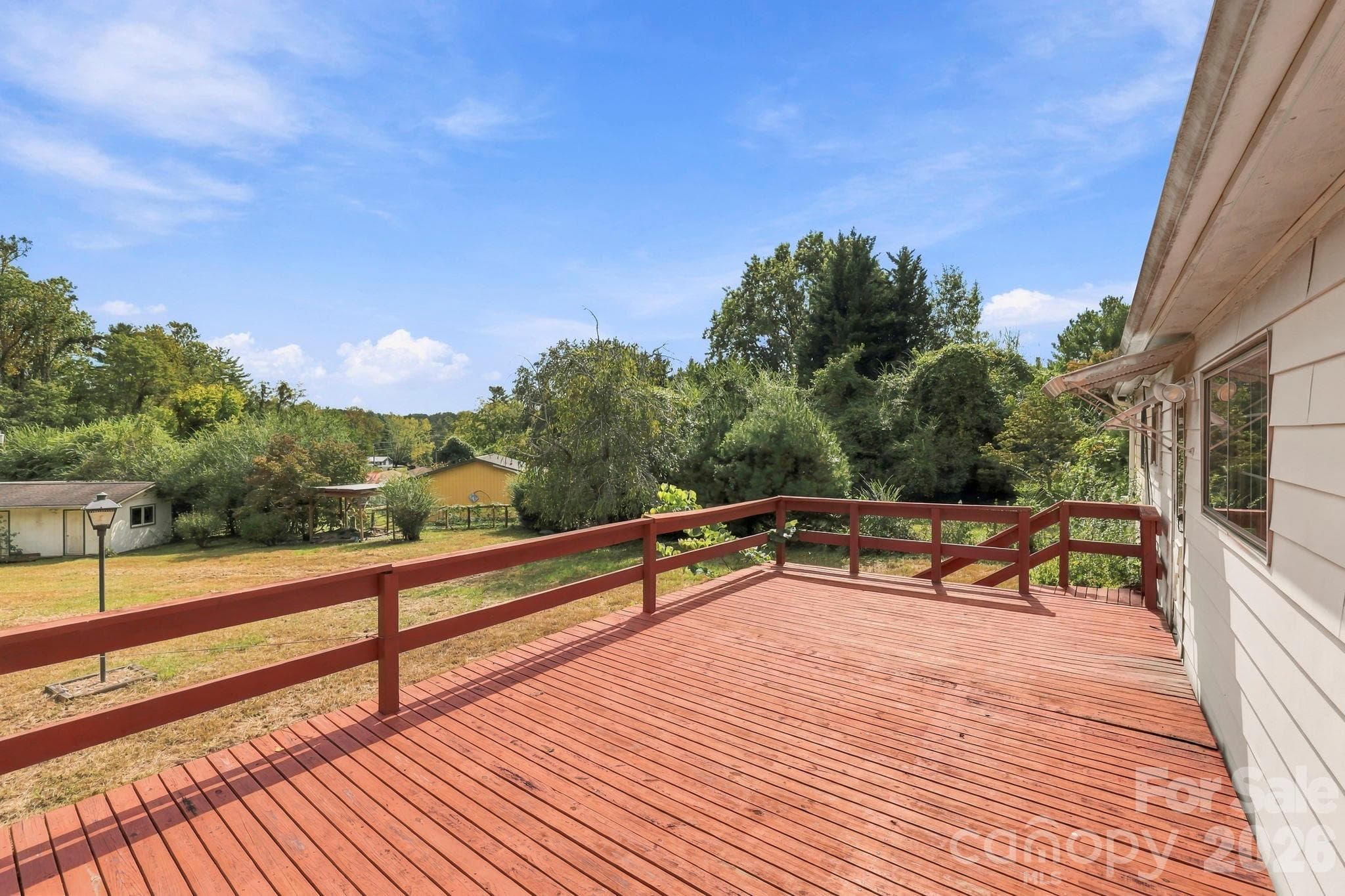 Large deck on rear of home overlooks spacious back yard - 648 Crystal Drive - 648 Crystal Drive, Hendersonville