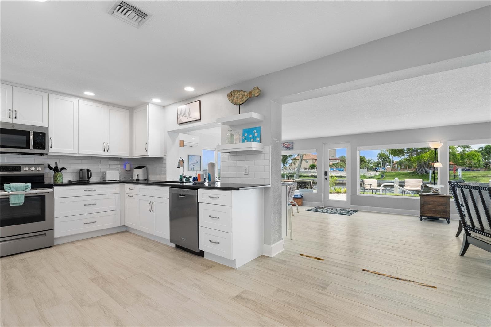 Single Family Residence at 2211 PALM TREE DR, PUNTA GORDA, photo 7 of 60