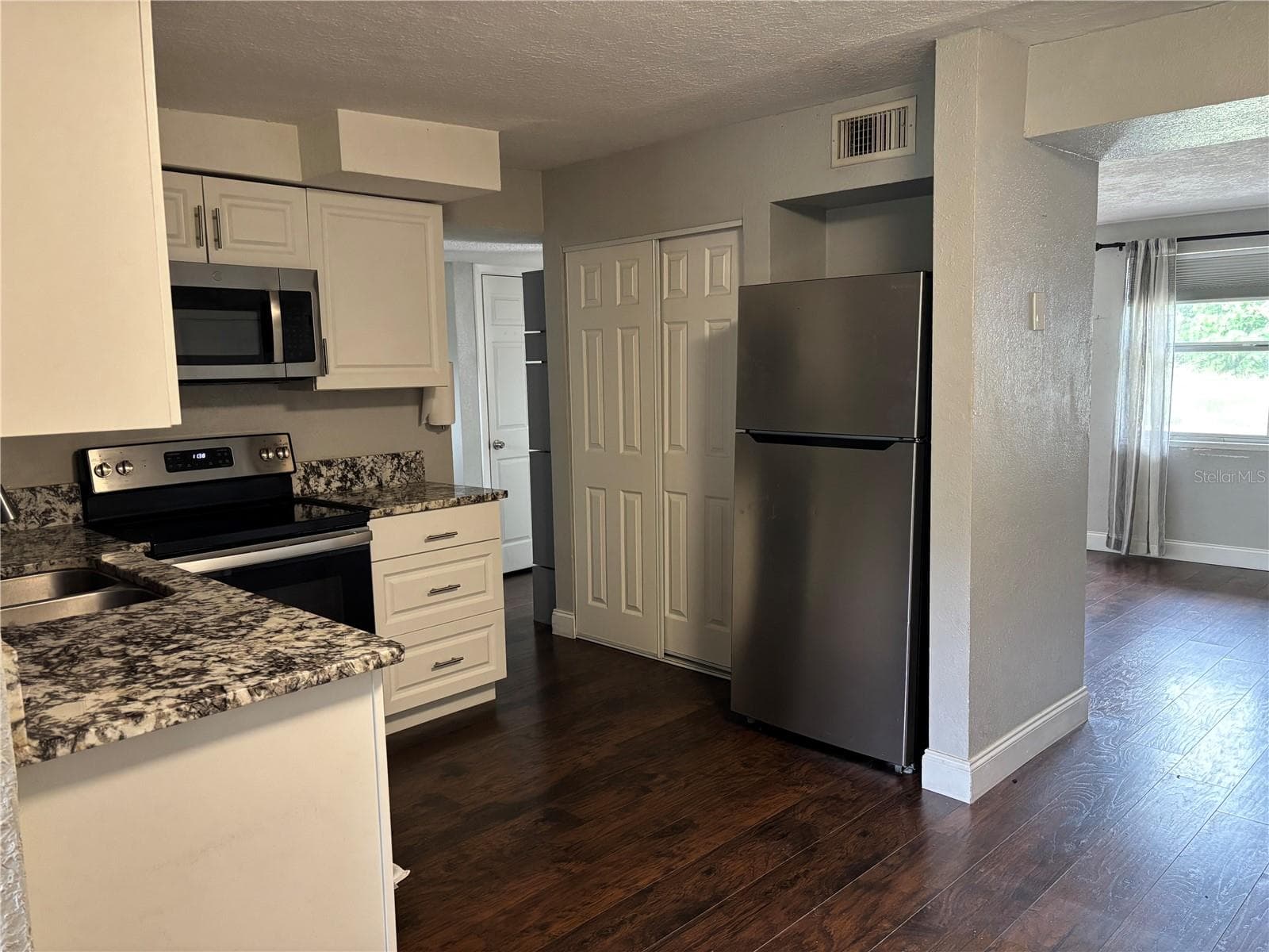 Single Family Residence at 11010 HASSLE AVE, PORT RICHEY, photo 9 of 19