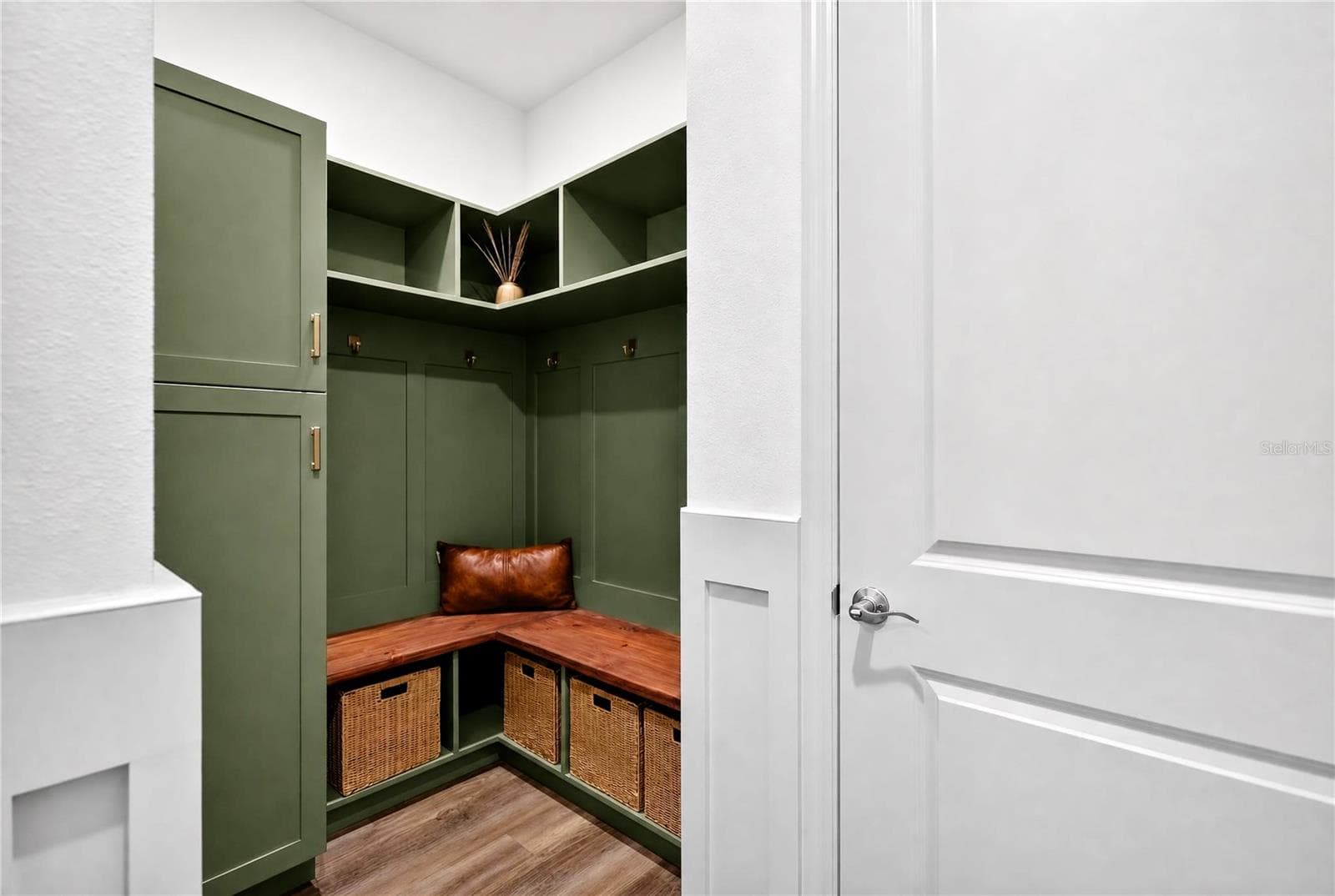 Entryway off garage with built ins - 18009 TAVERNSIDE TRL, LAKEWOOD RANCH