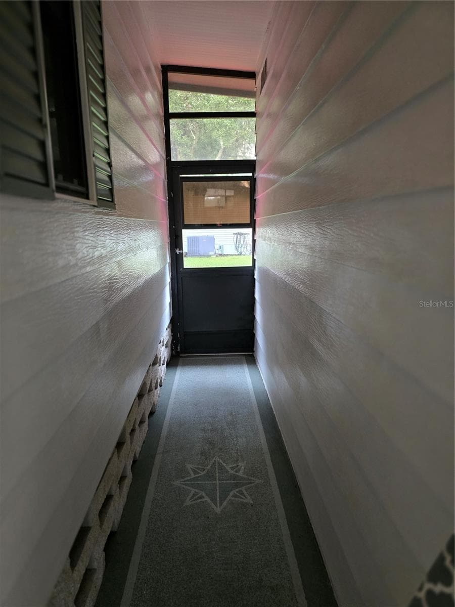 DOOR TO BACK YARD - 16802 HARLEY ST, HUDSON