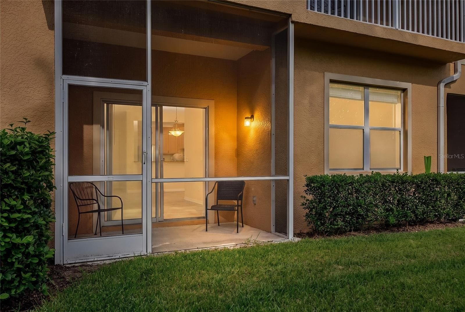 Screened lanai with pond view - 3707 PARKRIDGE CIR #7-106, SARASOTA