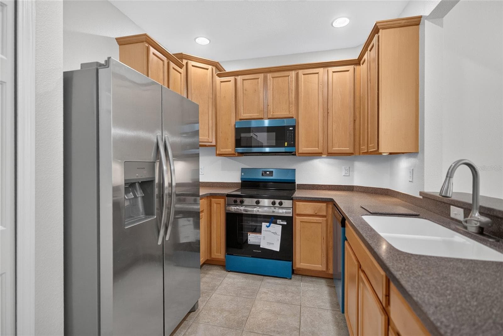 New stainless steel appliances - 3707 PARKRIDGE CIR #7-106, SARASOTA