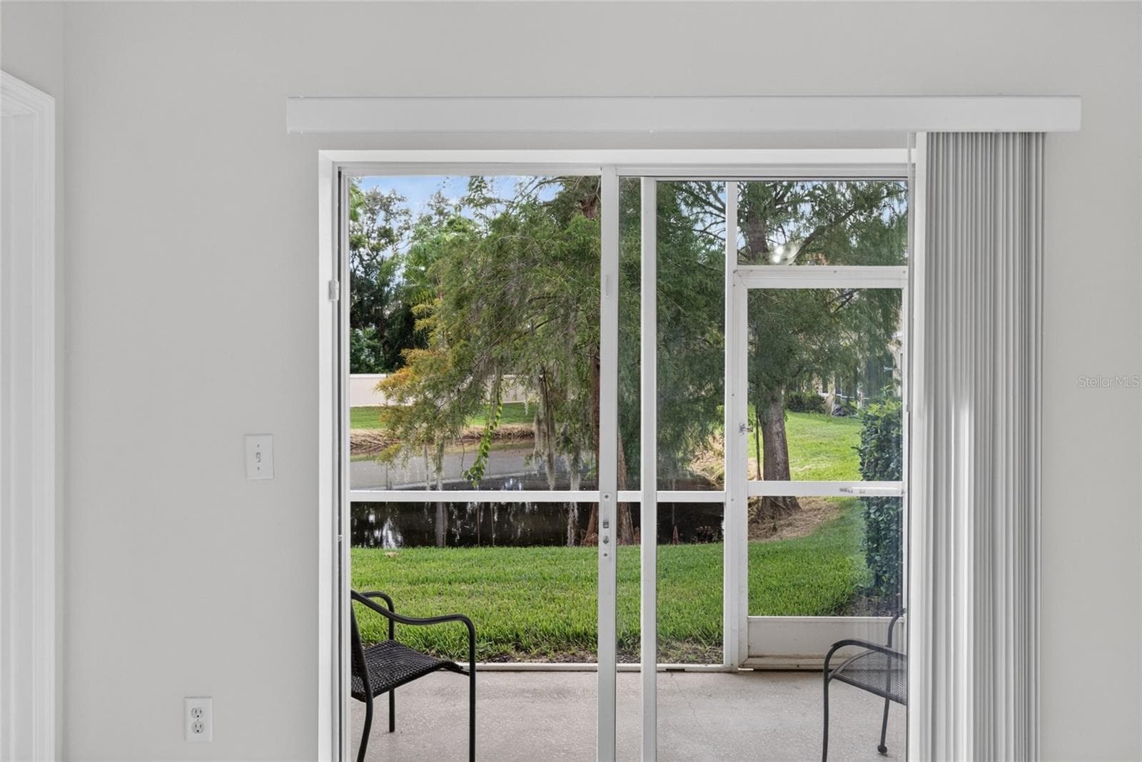 Pond view from the living room - 3707 PARKRIDGE CIR #7-106, SARASOTA